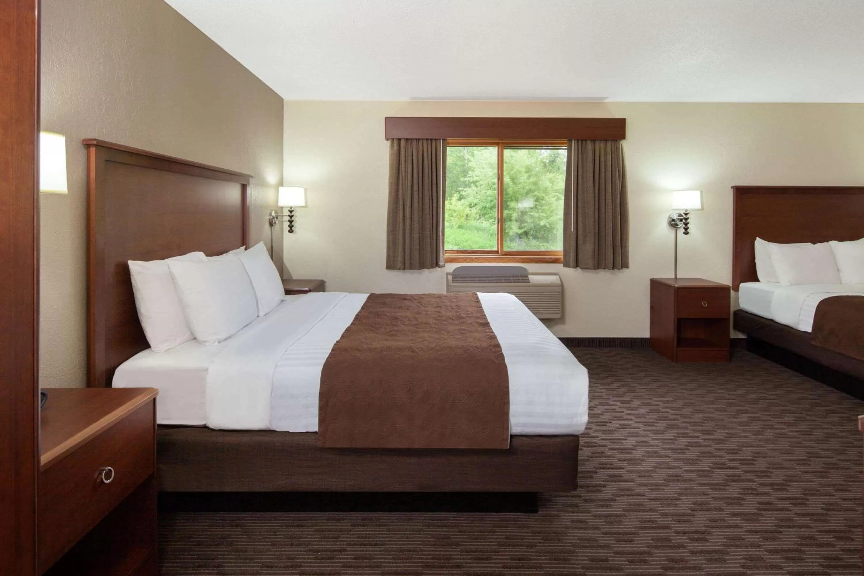 Photo of the whole room, Bed in AmericInn by Wyndham Ironwood