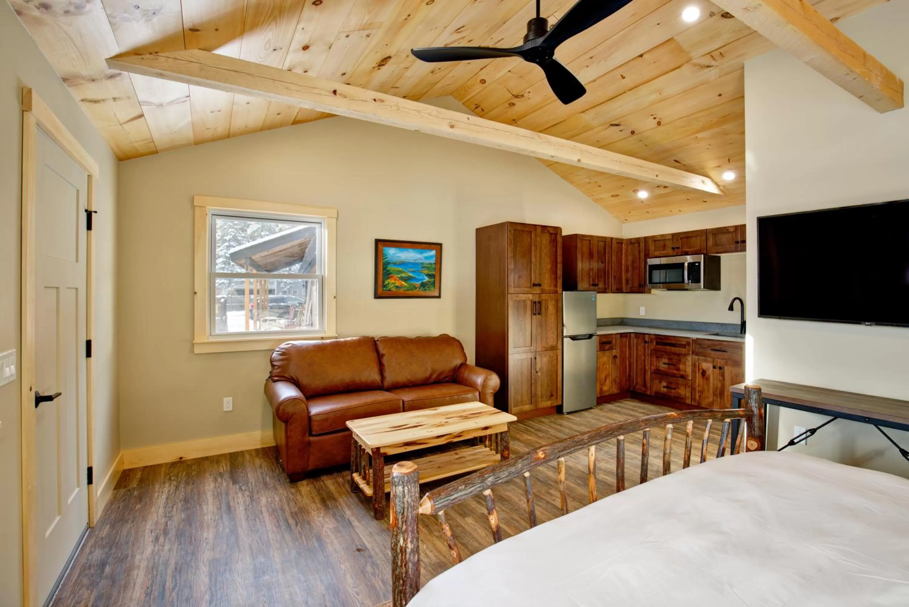Bed in The Lodge by Sunapee Stays