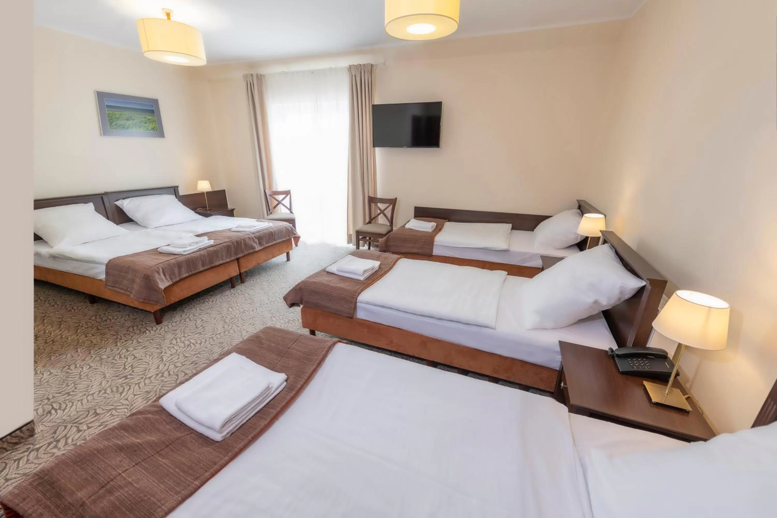 Bed in Hotel Mona Lisa Wellness & Spa