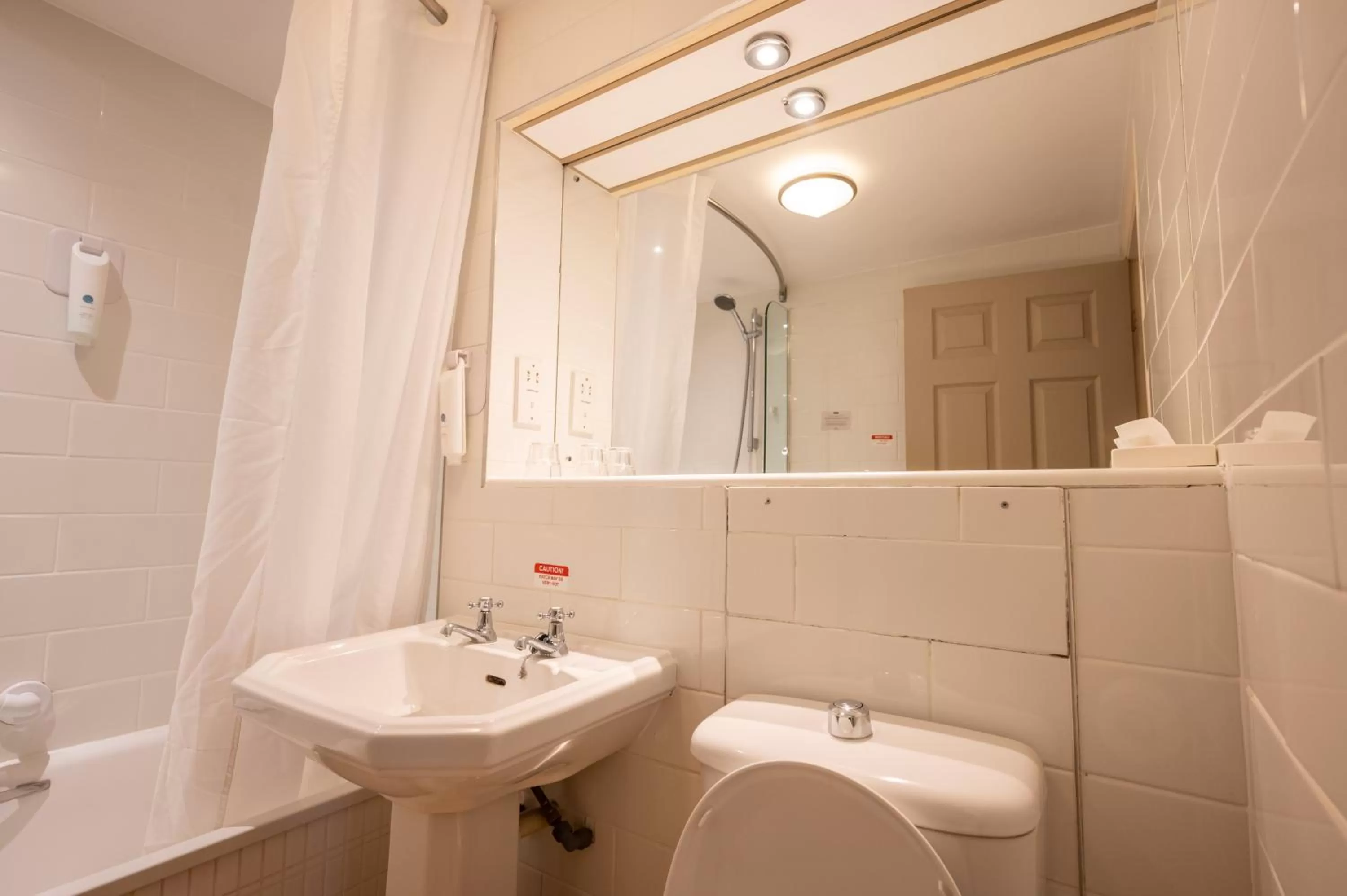 Bathroom in Castle and Ball by Greene King Inns