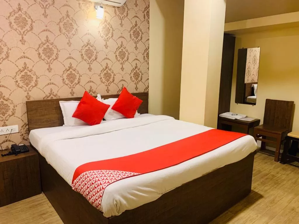 Bed in Hotel Neelkanth