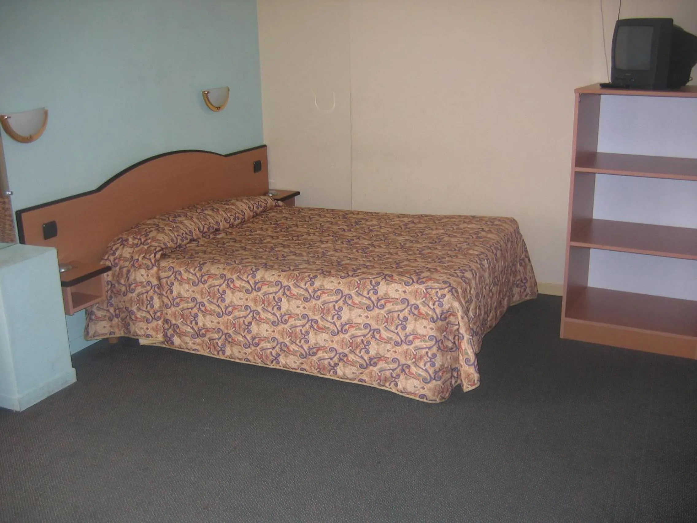 Bed in Hotel Ferney République