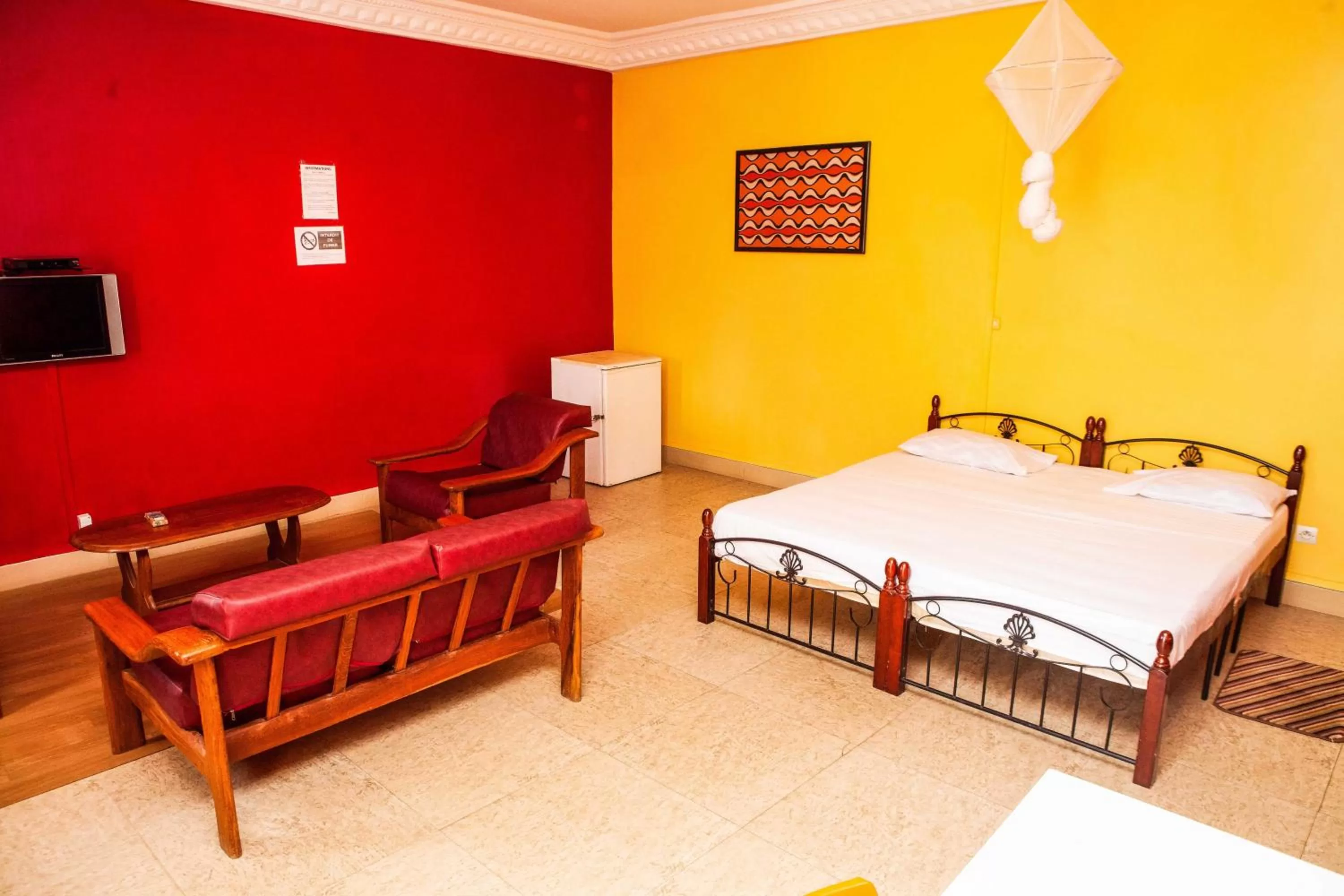Photo of the whole room, Bed in Résidence abdou diouf