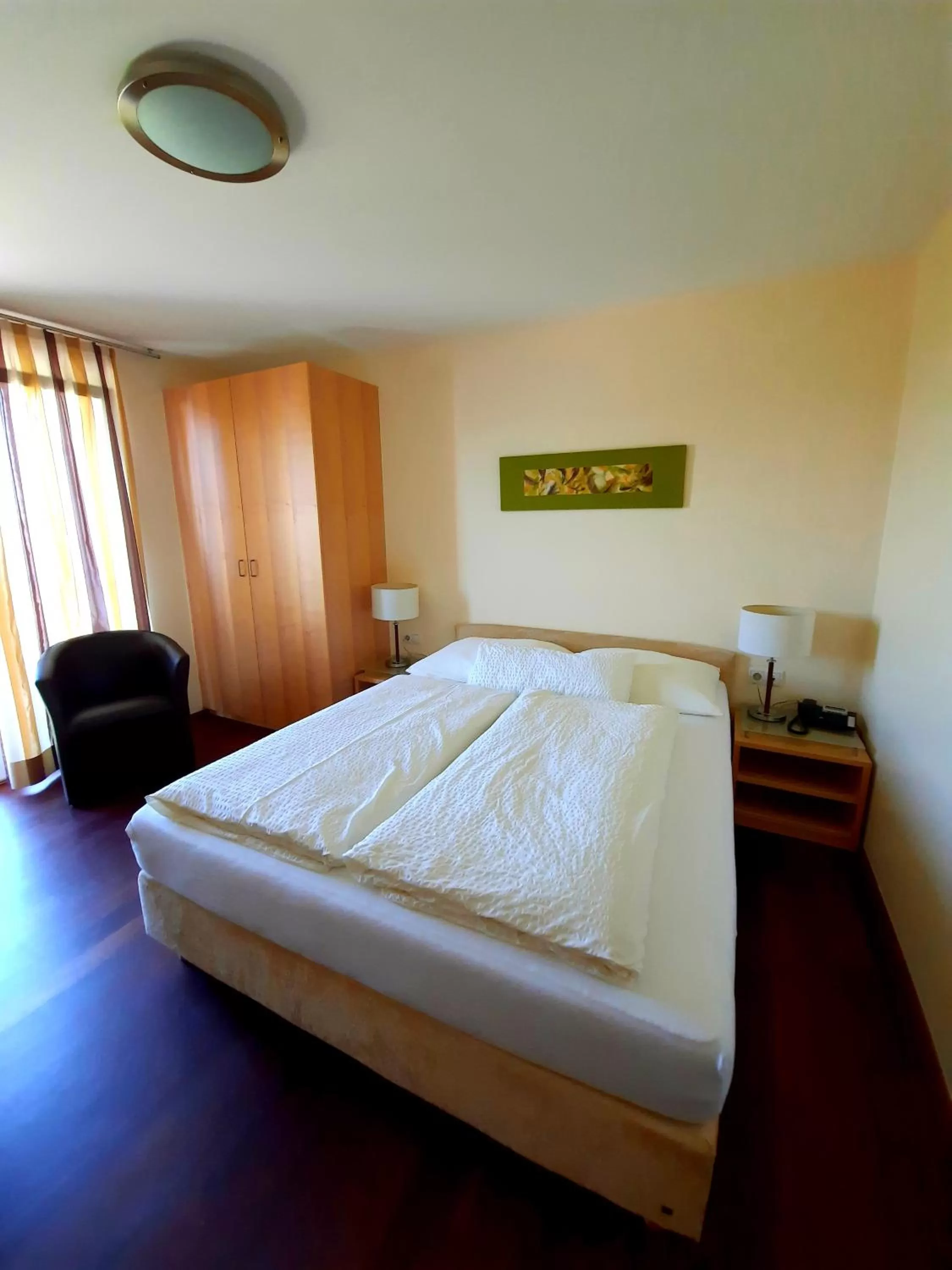 Bed in Das smarte Hotel garni