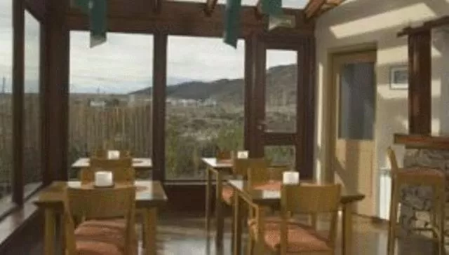 Lounge or bar in Hosteria Roblesur