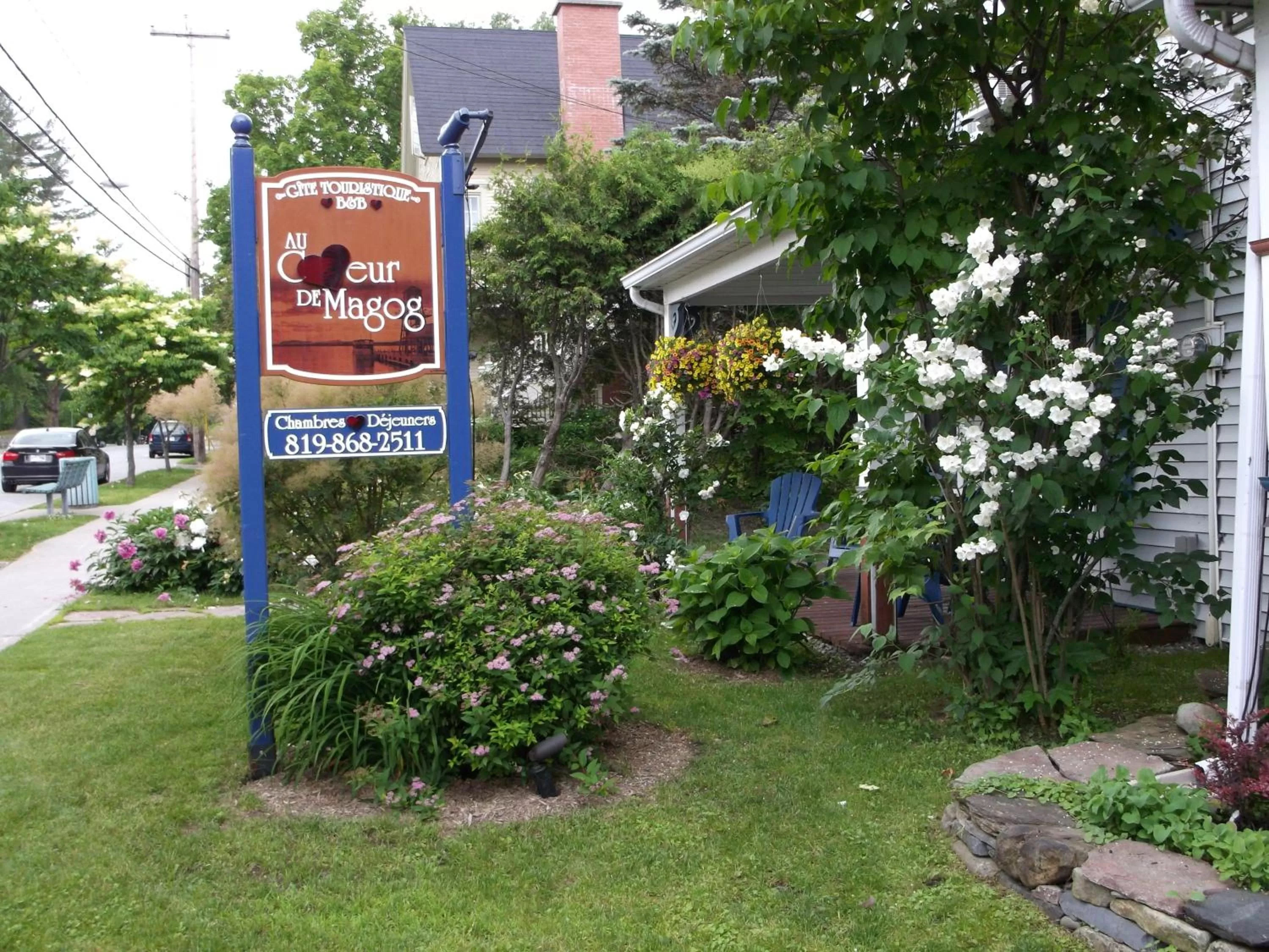 Property logo or sign in Au Coeur De Magog