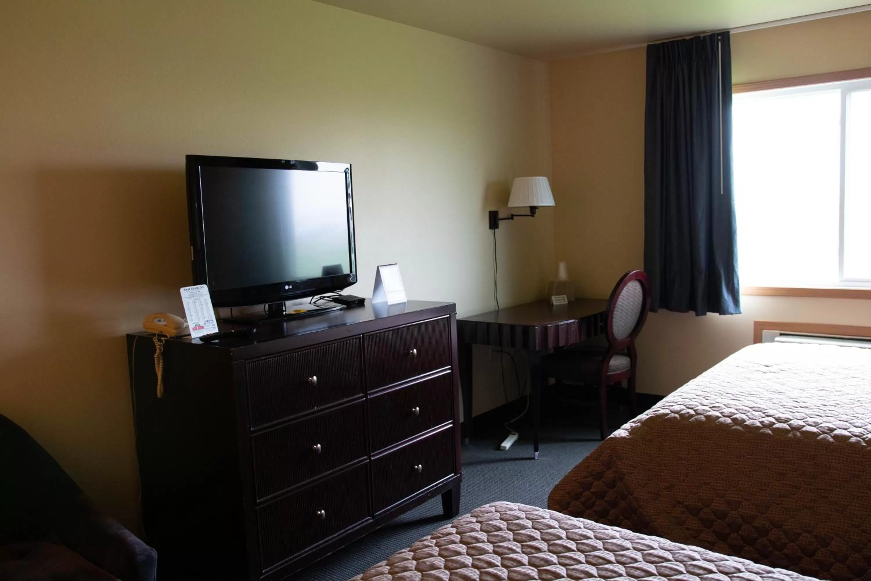 Bed in East Grand Inn