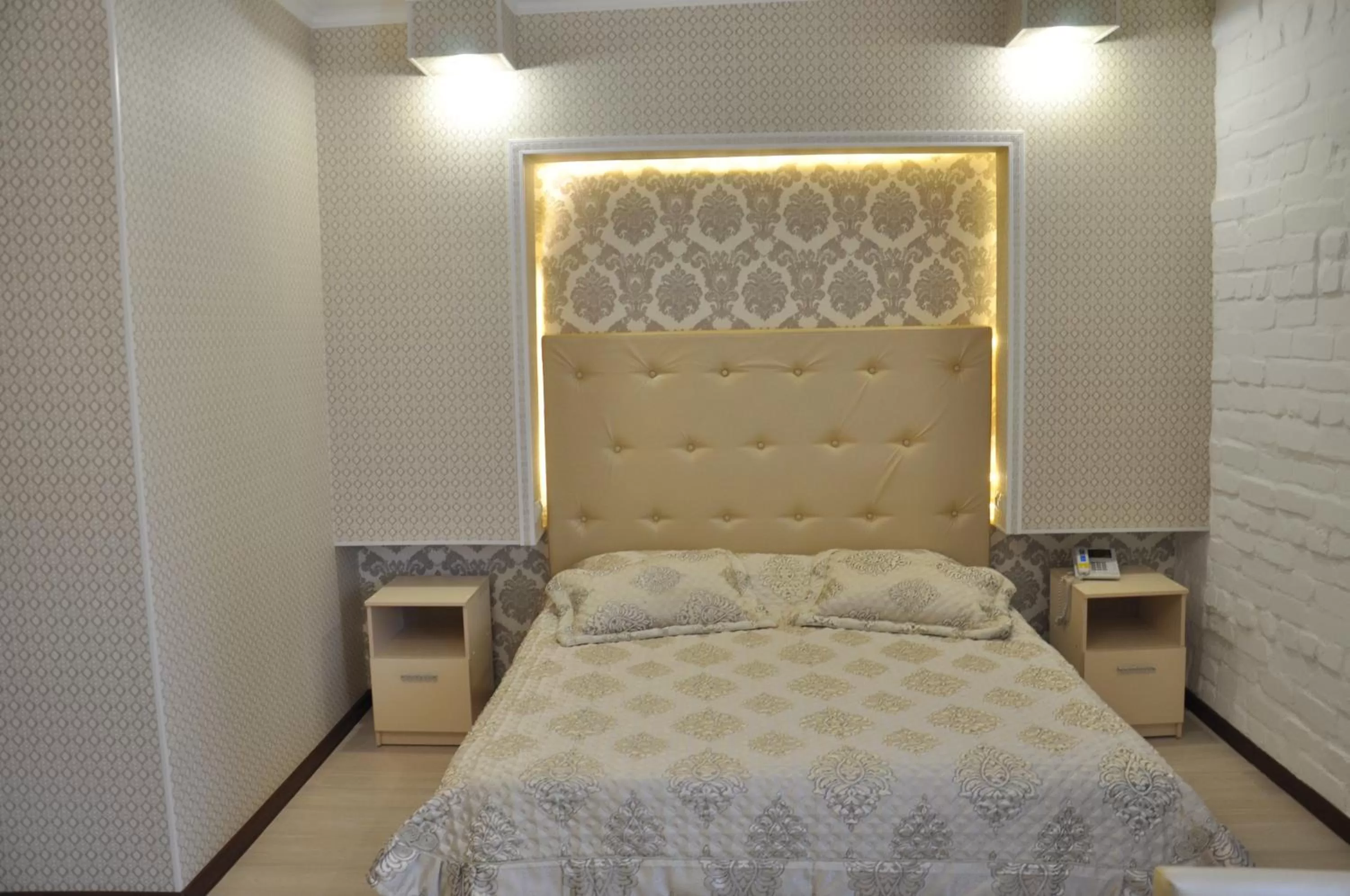 Bed in Astina Hotel