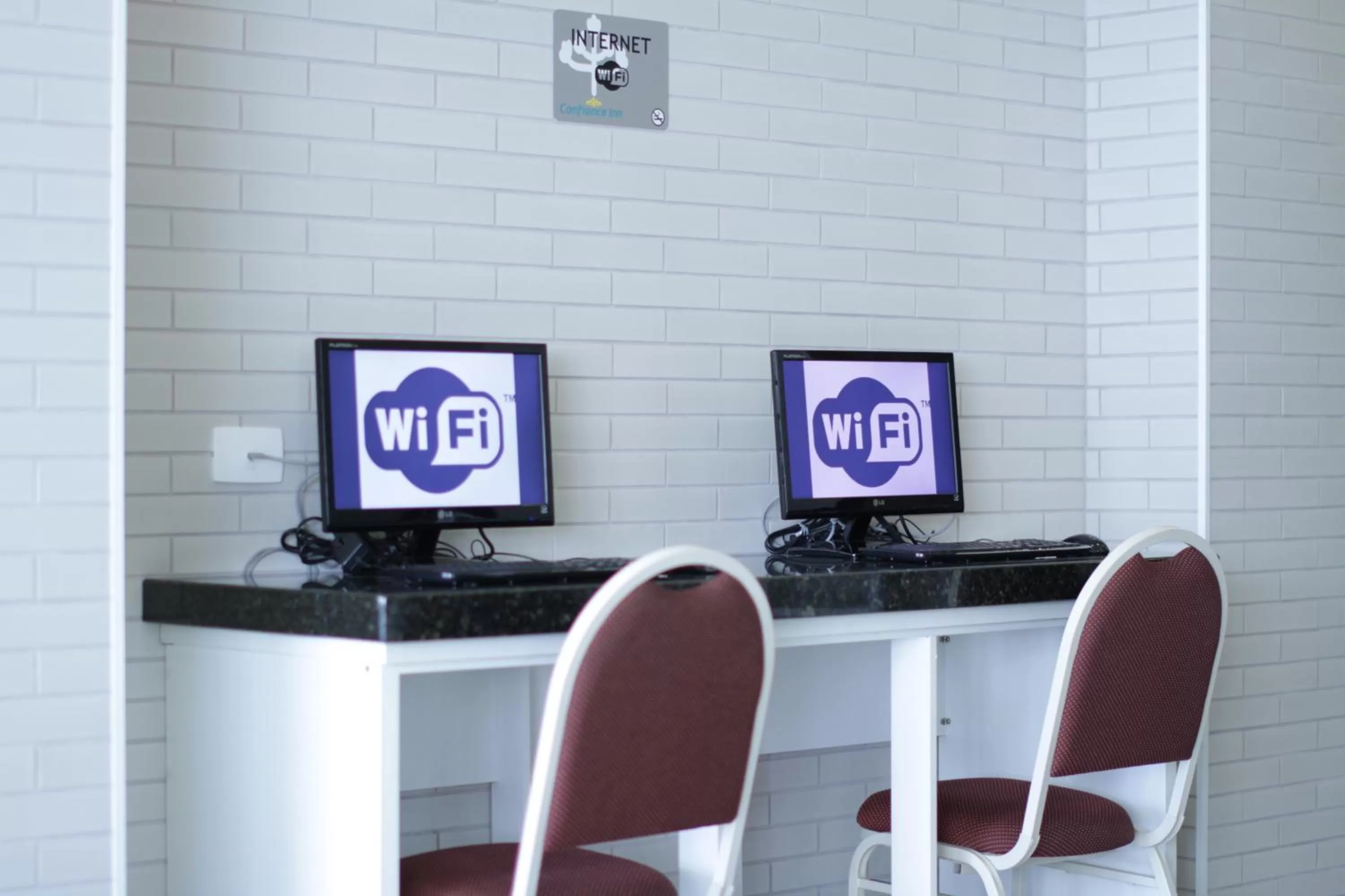 Lobby or reception in Hotel Confiance Centro Cívico