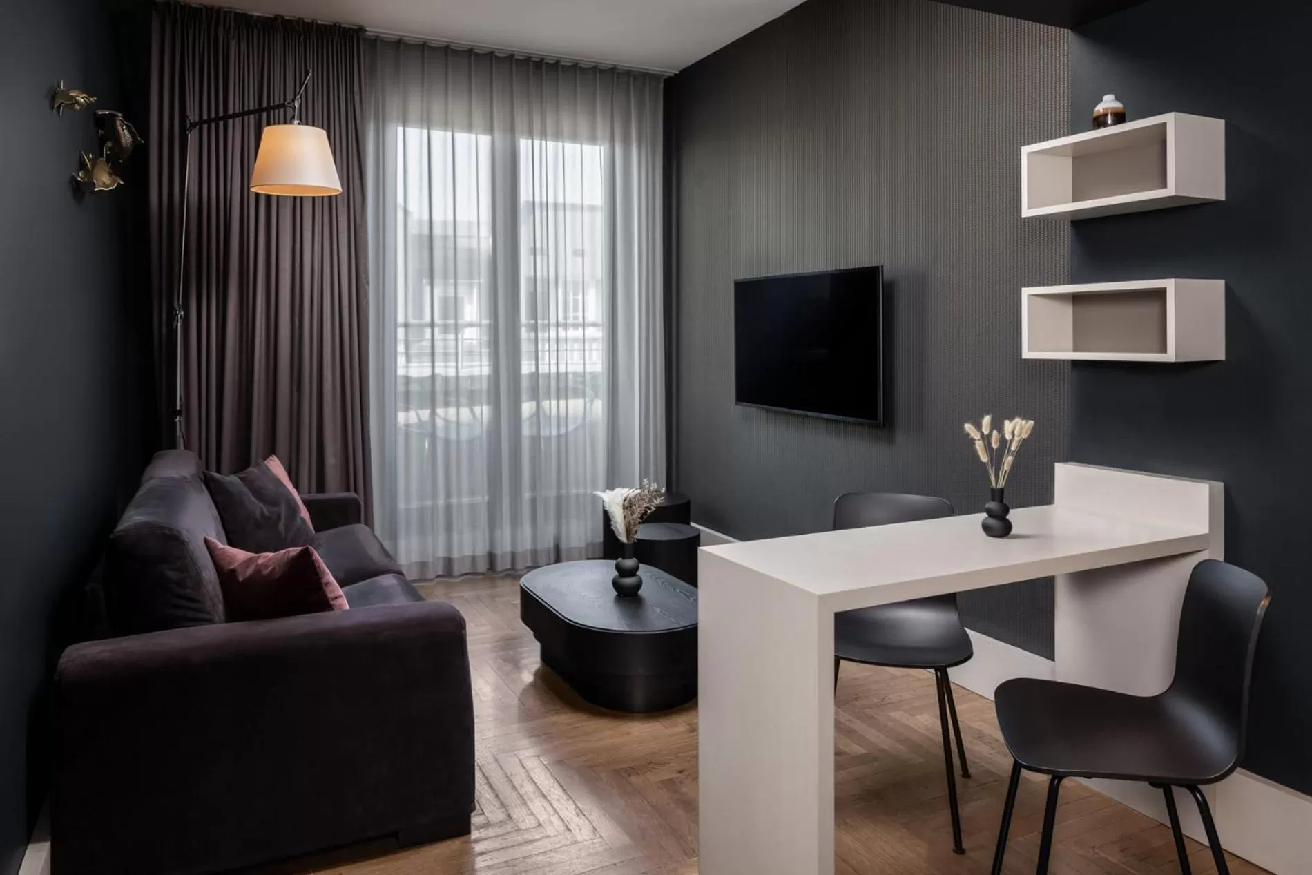 TV and multimedia in Hotel AMANO Rooms & Apartments