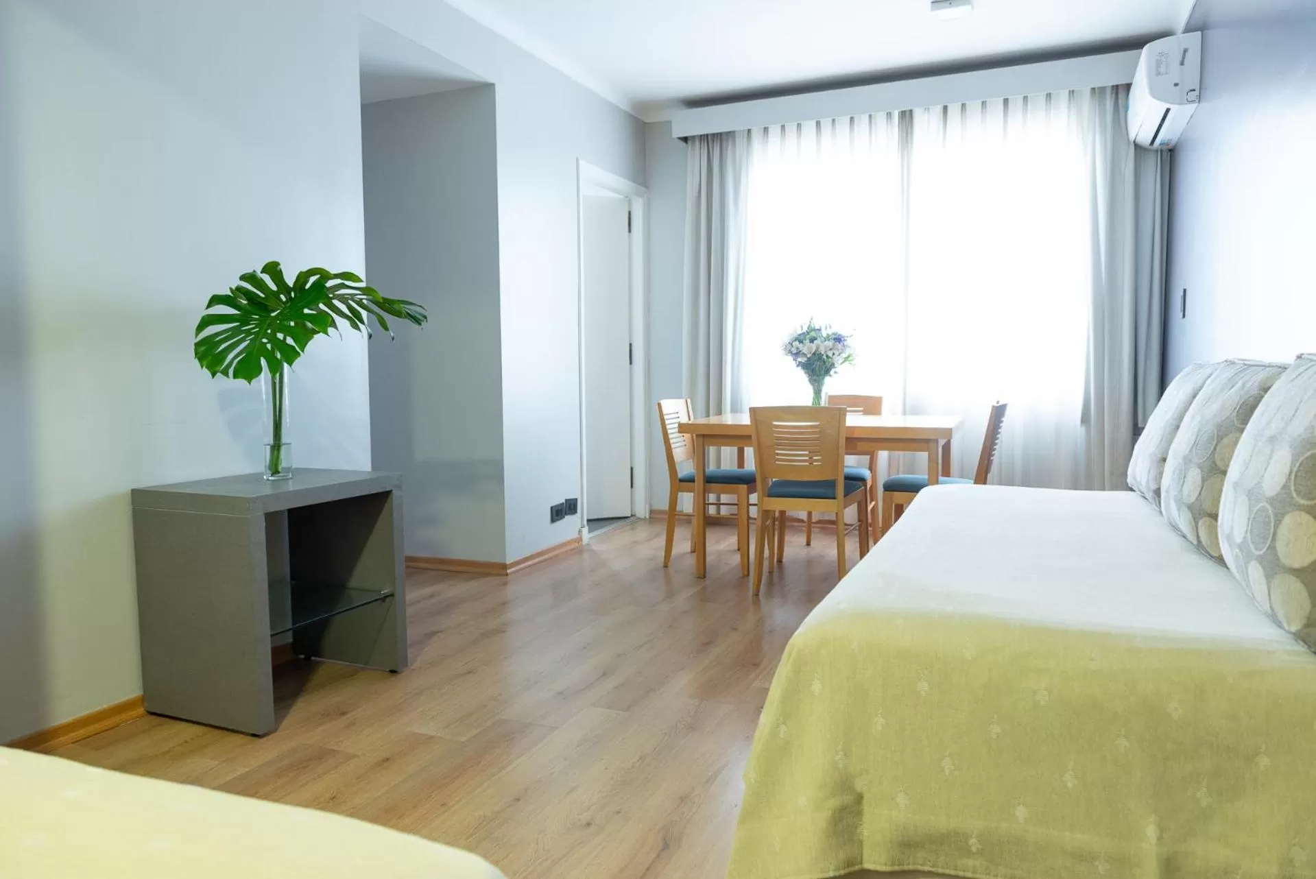 Bed in Portal Plaza Suites