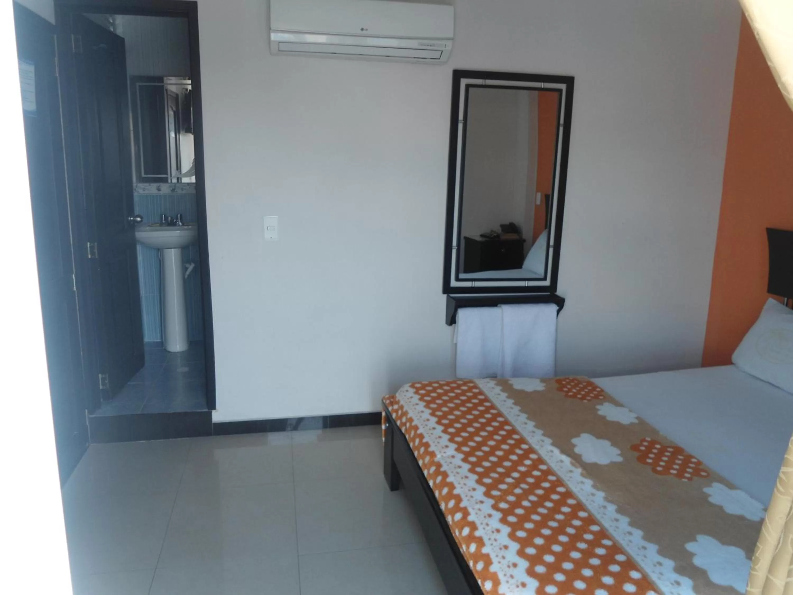 Bed in Hotel Palmeras De Mariana