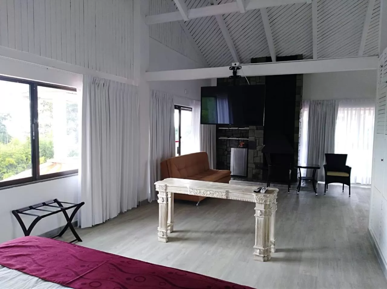 Living room, TV/Entertainment Center in Cotinga Hotel Spa