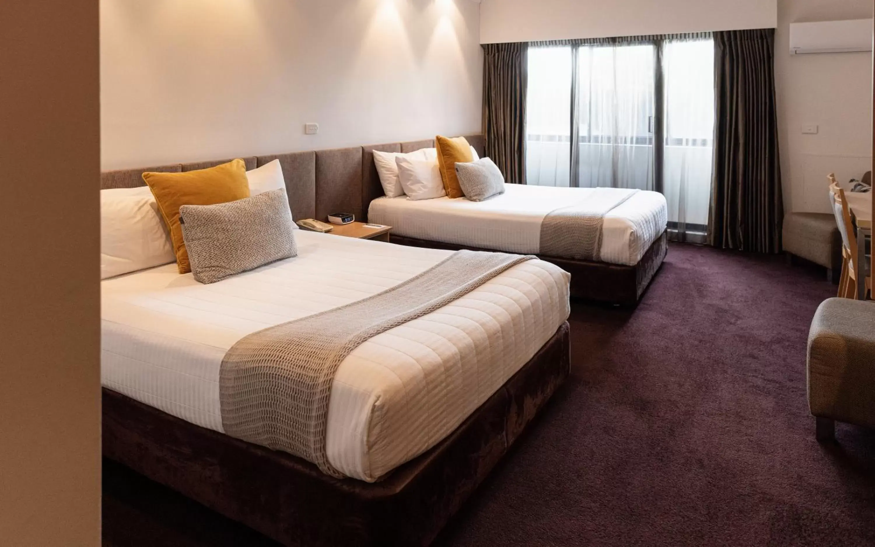 Deluxe Double Queen Room with Balcony in The Executive Inn, Newcastle Deluxe Double Queen Room with Balcony in The Executive Inn, Newcastle