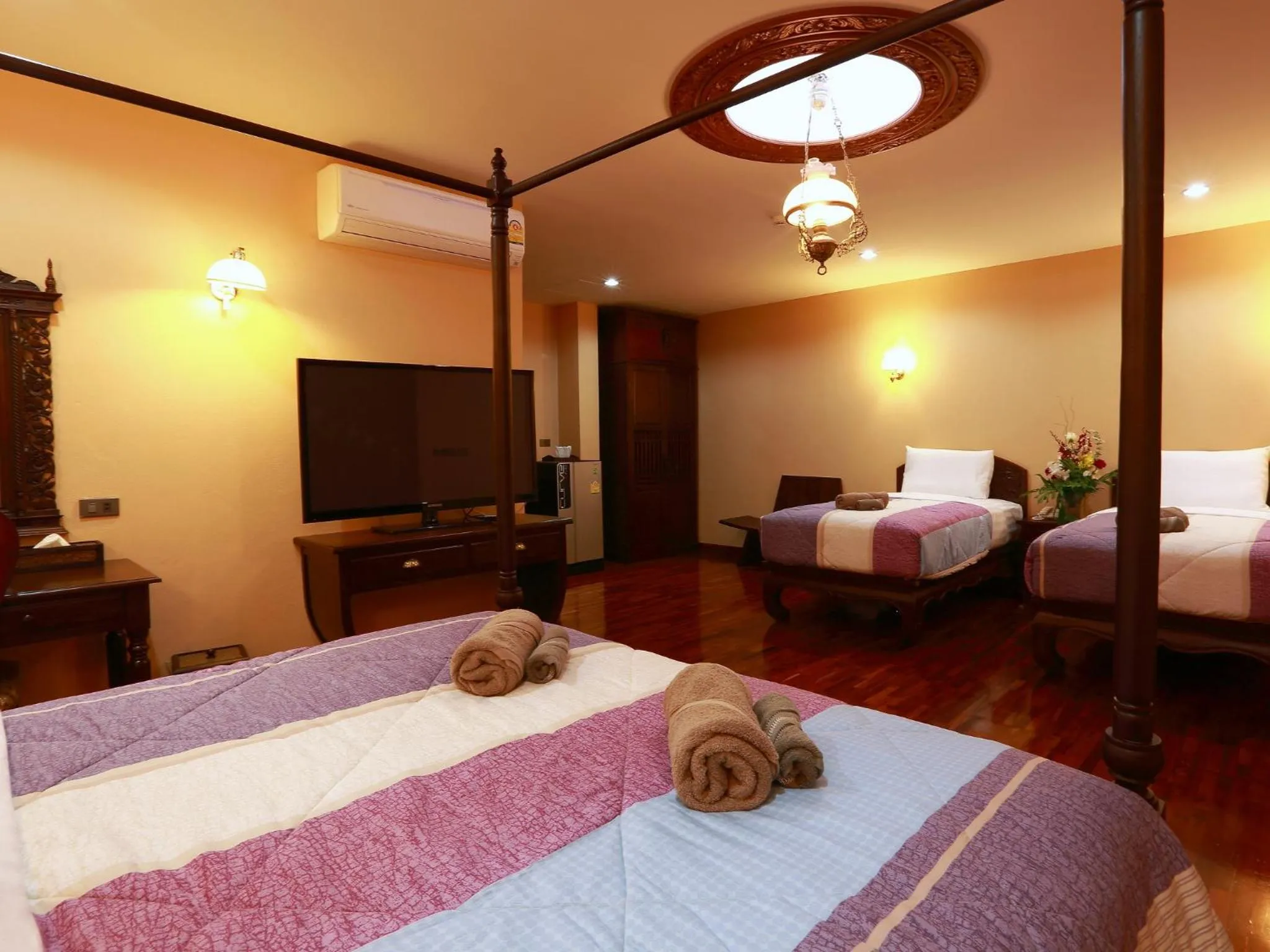 Bed in At Chiang Mai Hotel