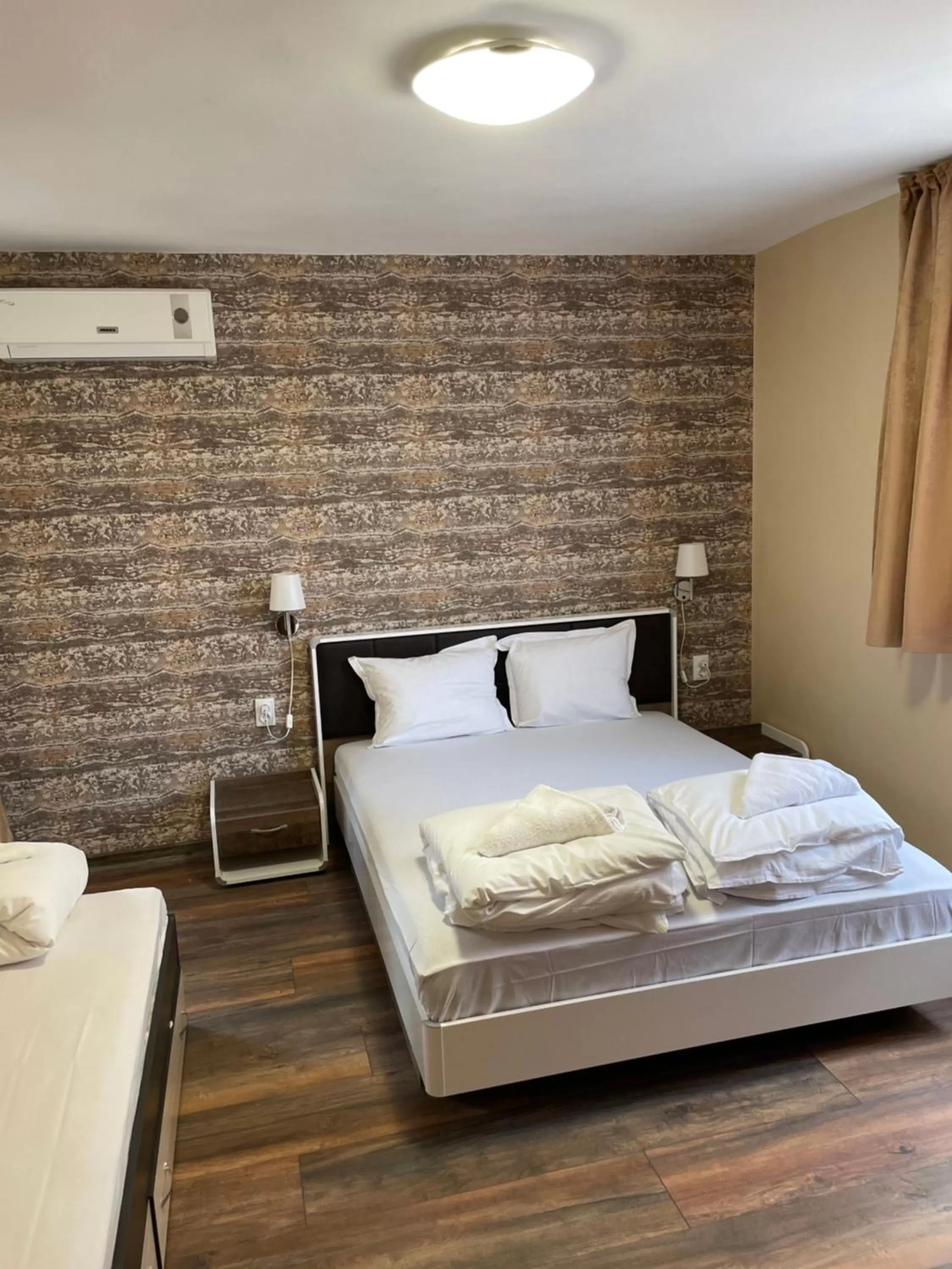 Bed in Family Hotel Malibu