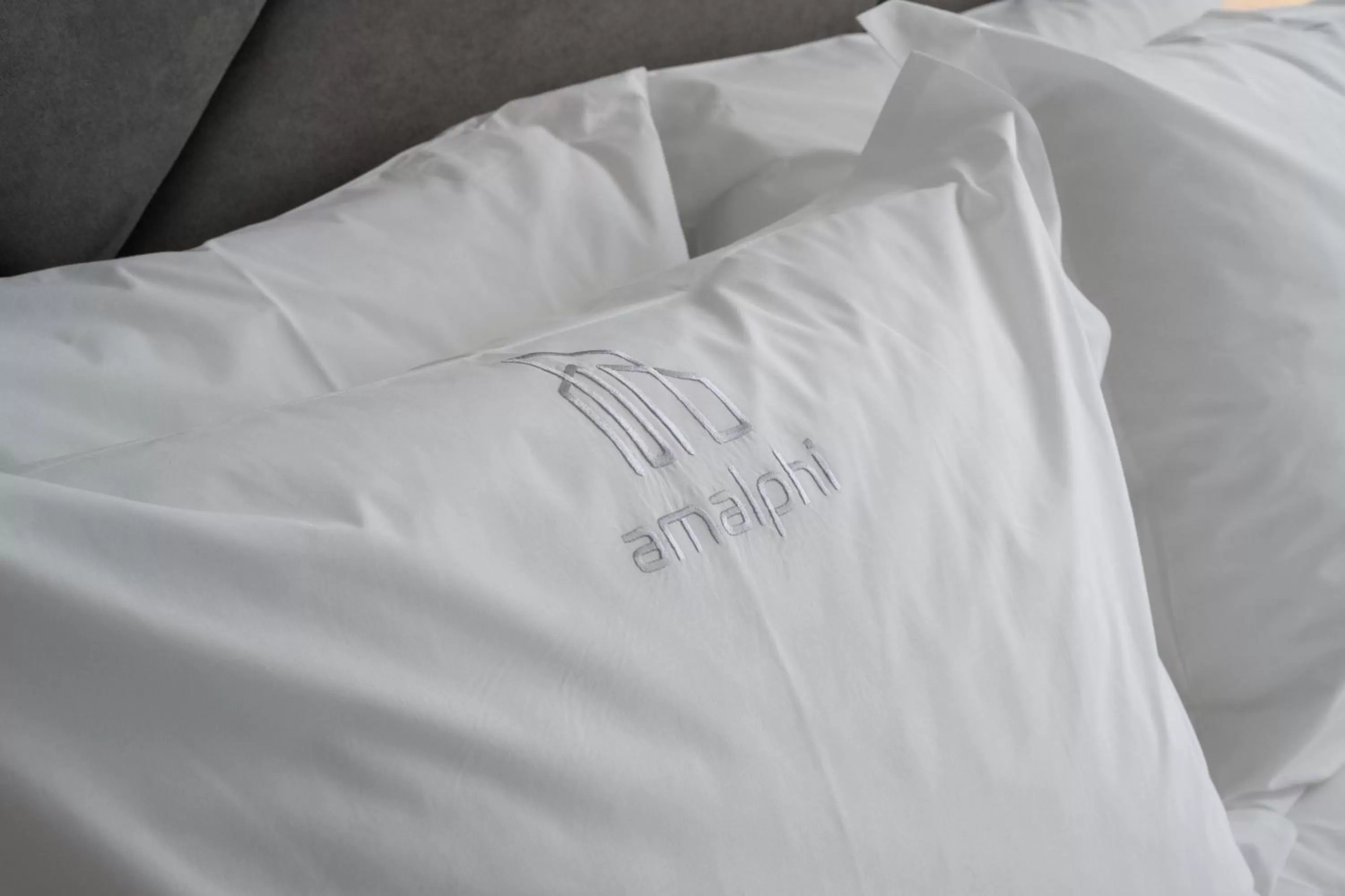 Bed in AMALPHI Corfu City Living