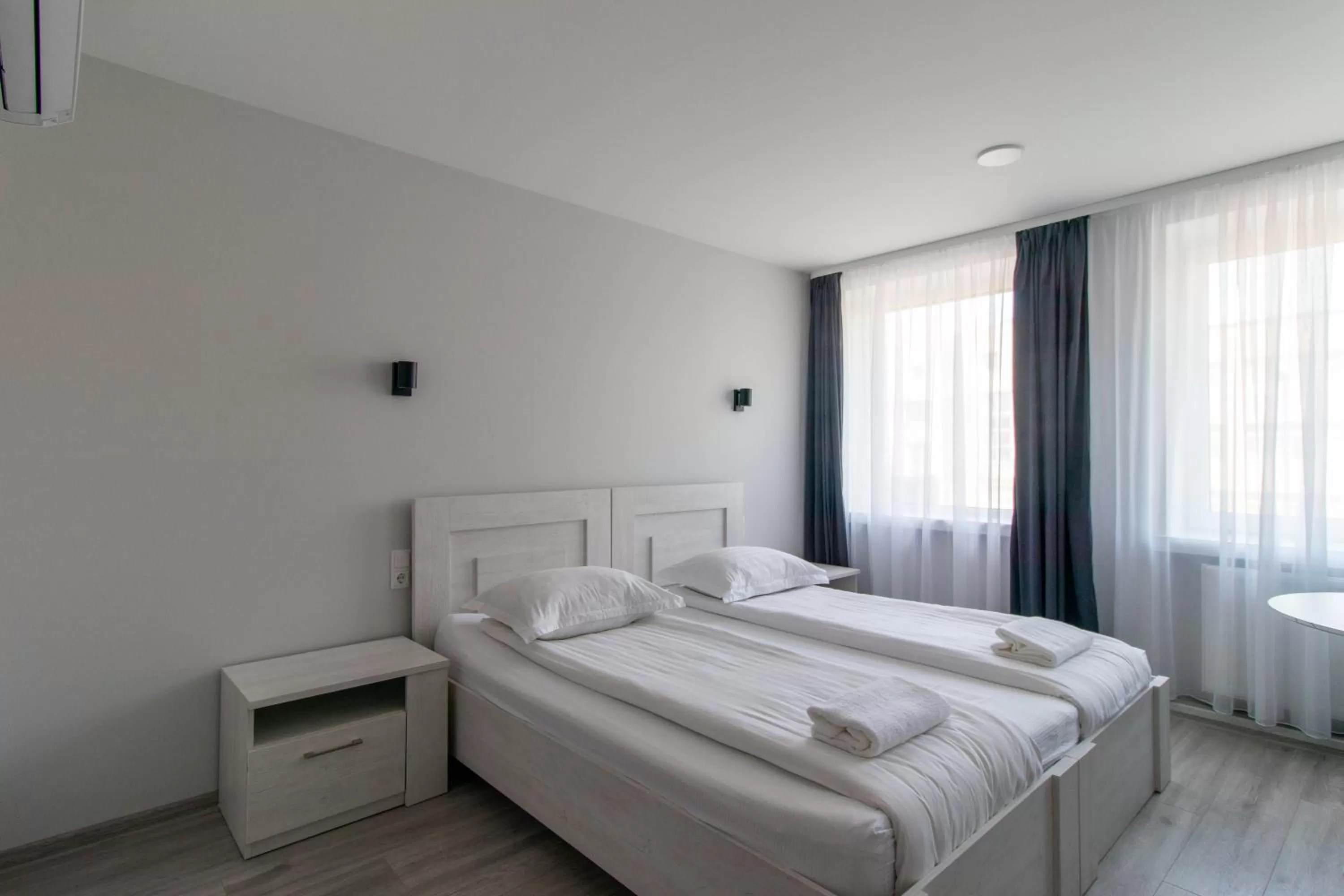 Bed in Dzukija Hotel