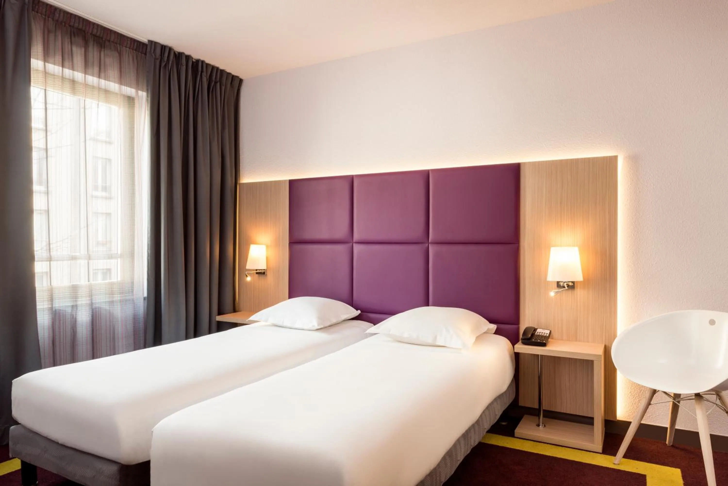 Bed in Aparthotel Adagio Paris Malakoff Chatillon