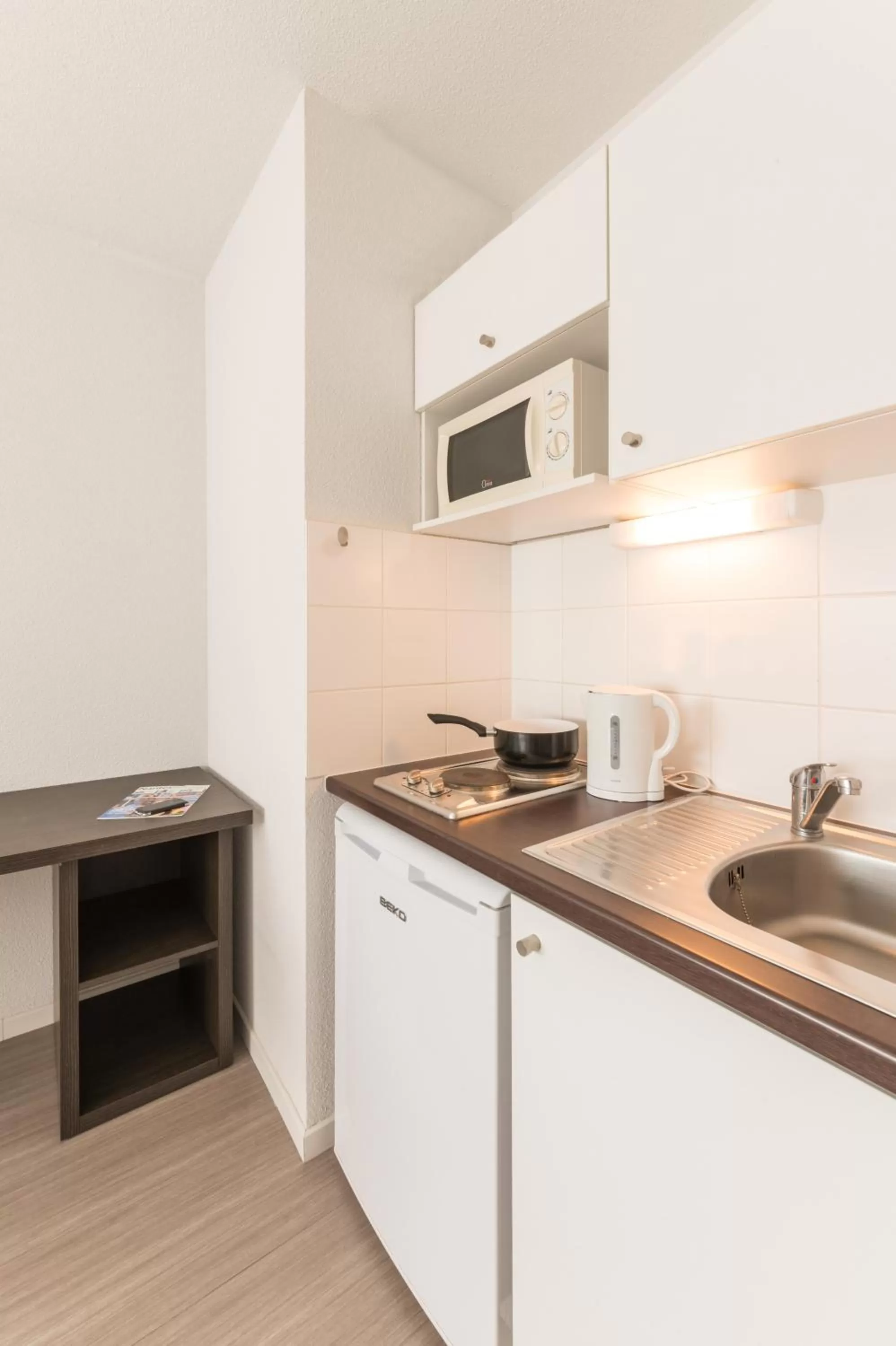 Kitchen or kitchenette in City Résidence Nantes La Chantrerie