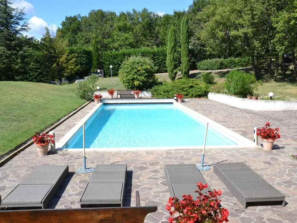 Pool view in La Devinière