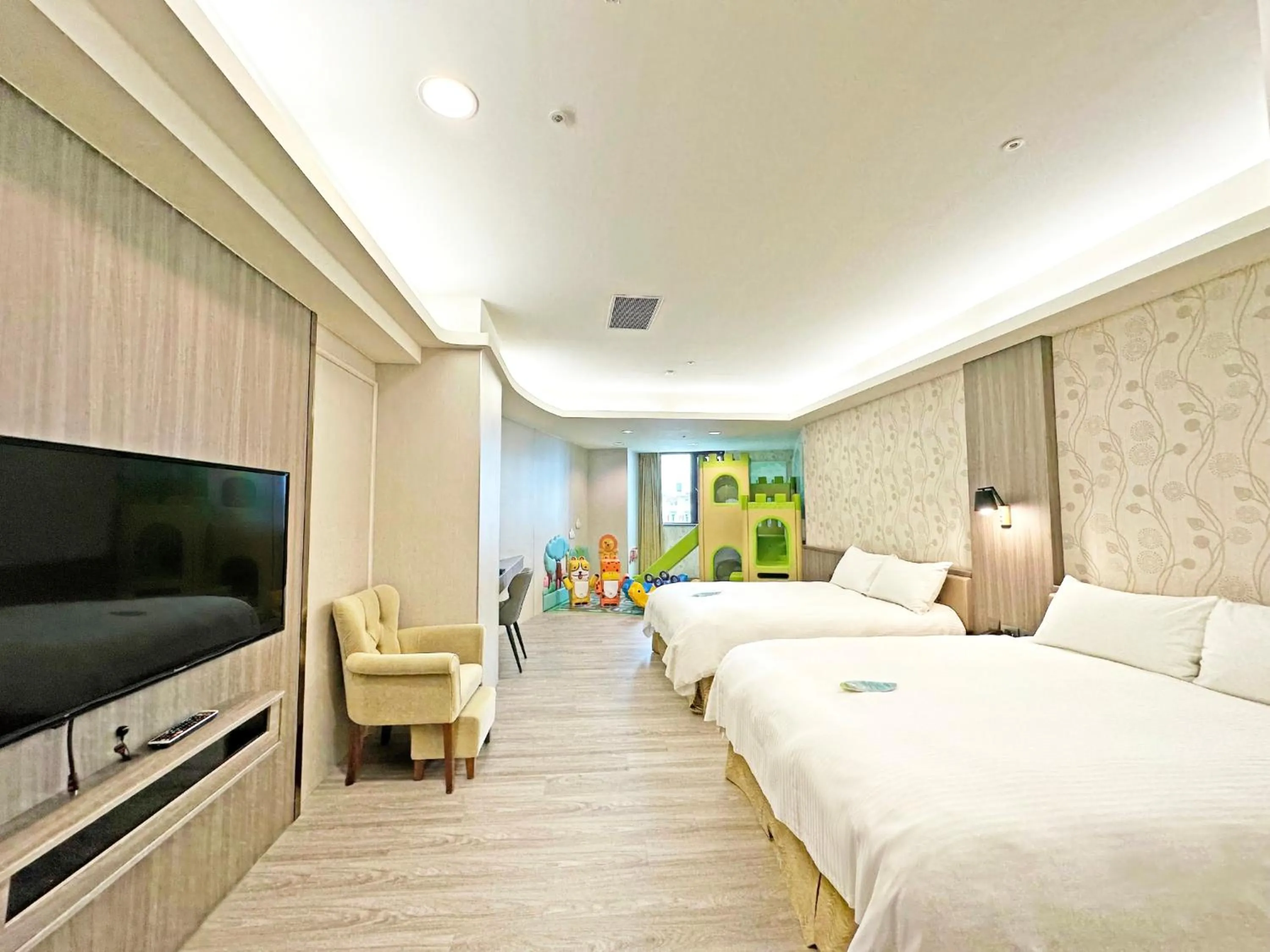 Bed in Grand Earl Hotel