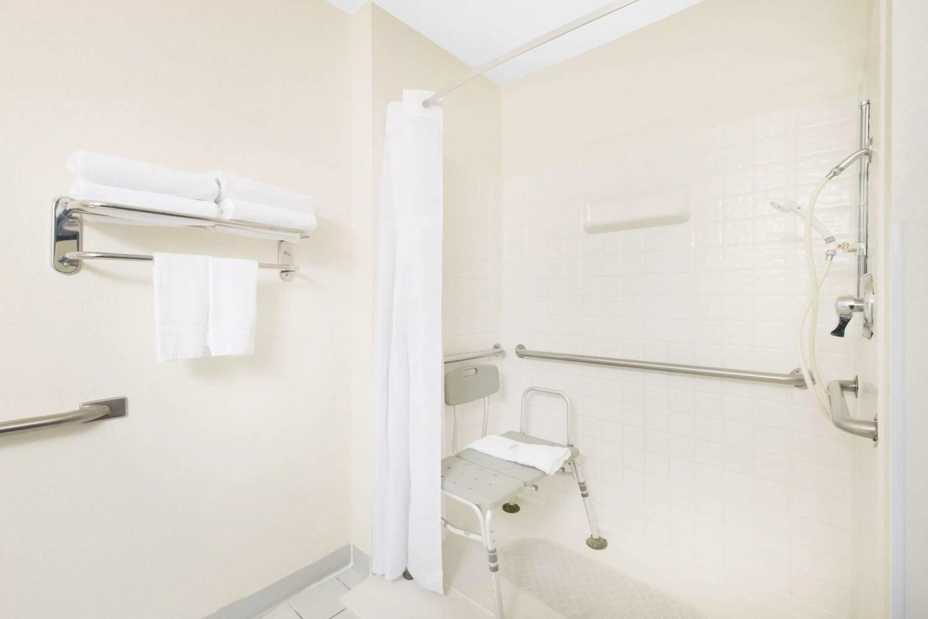 Bathroom in Days Inn & Suites by Wyndham Fargo 19th Ave/Airport Dome