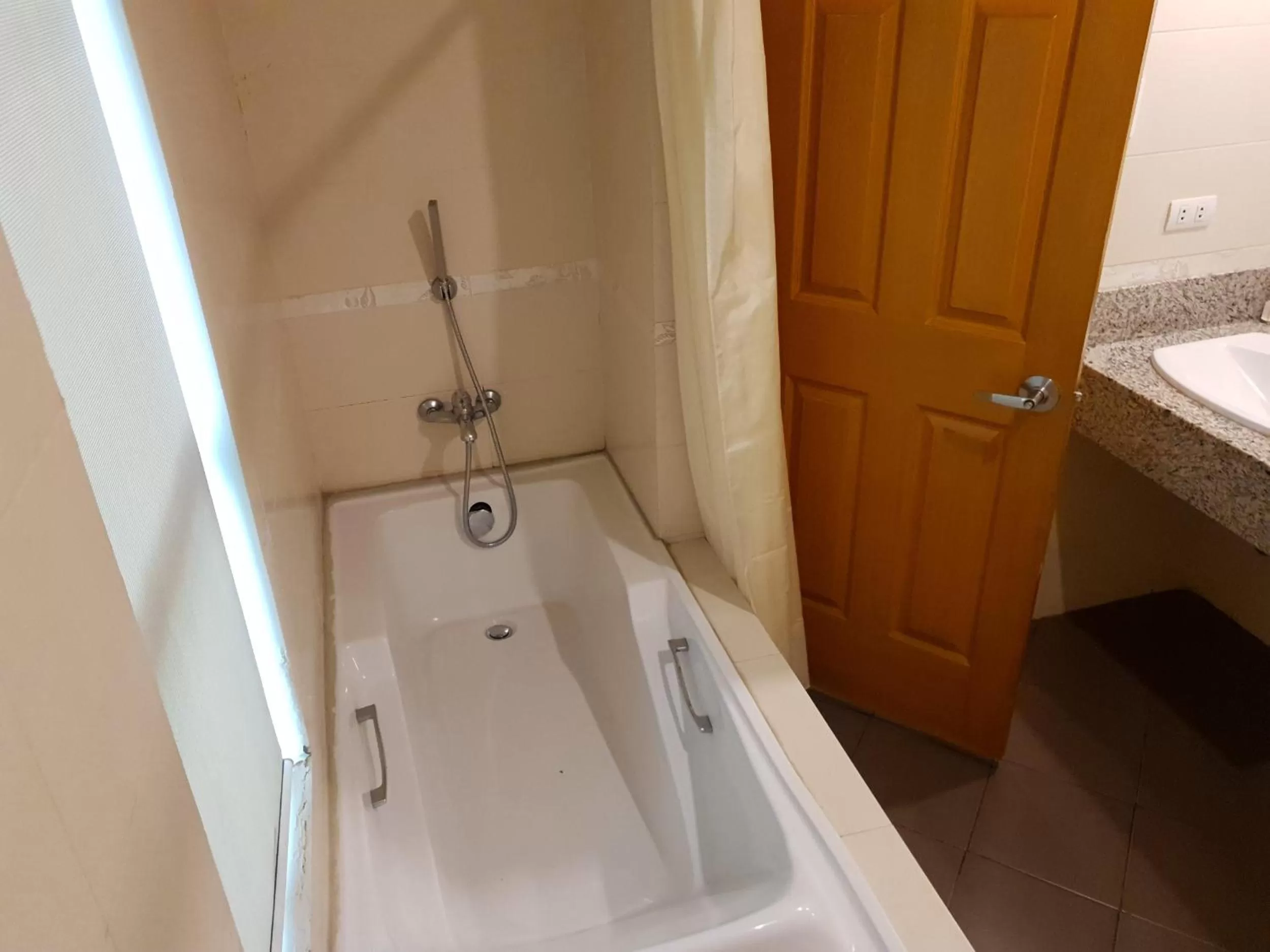 Bathroom in Festive Hotel Makati