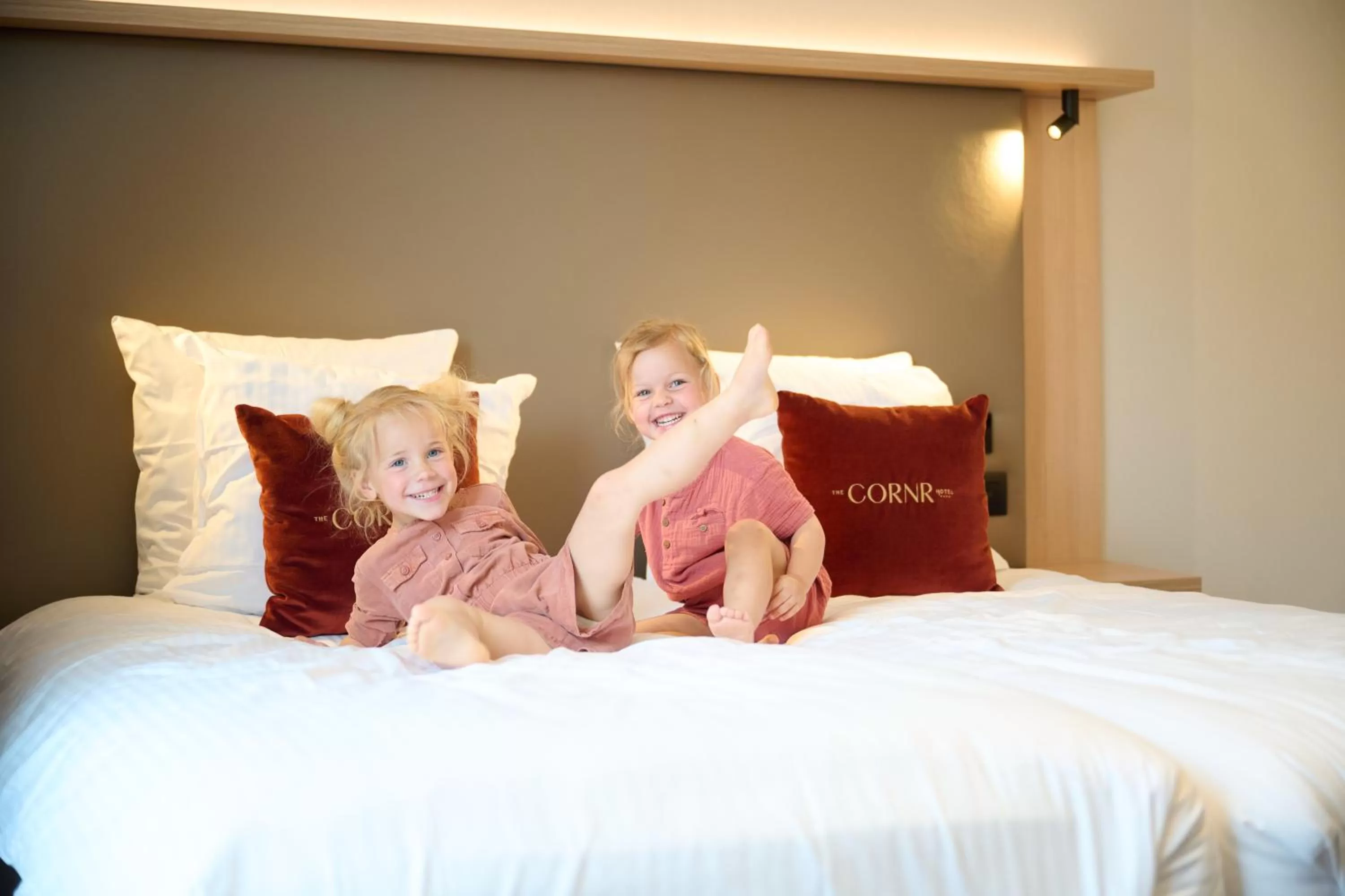 Bed in The CORNR Hotel