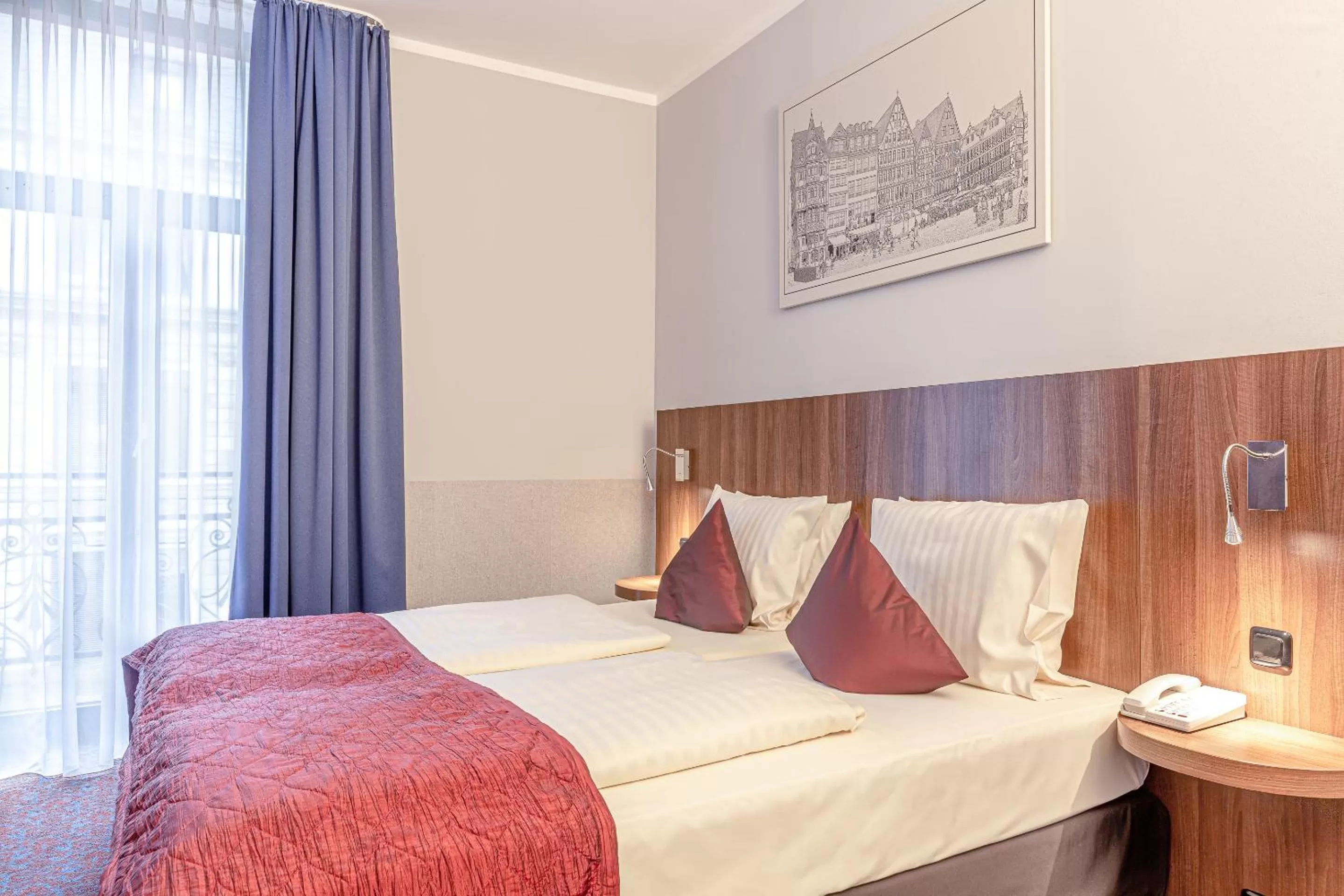 Bed in Ramada by Wyndham Frankfurt Central Station