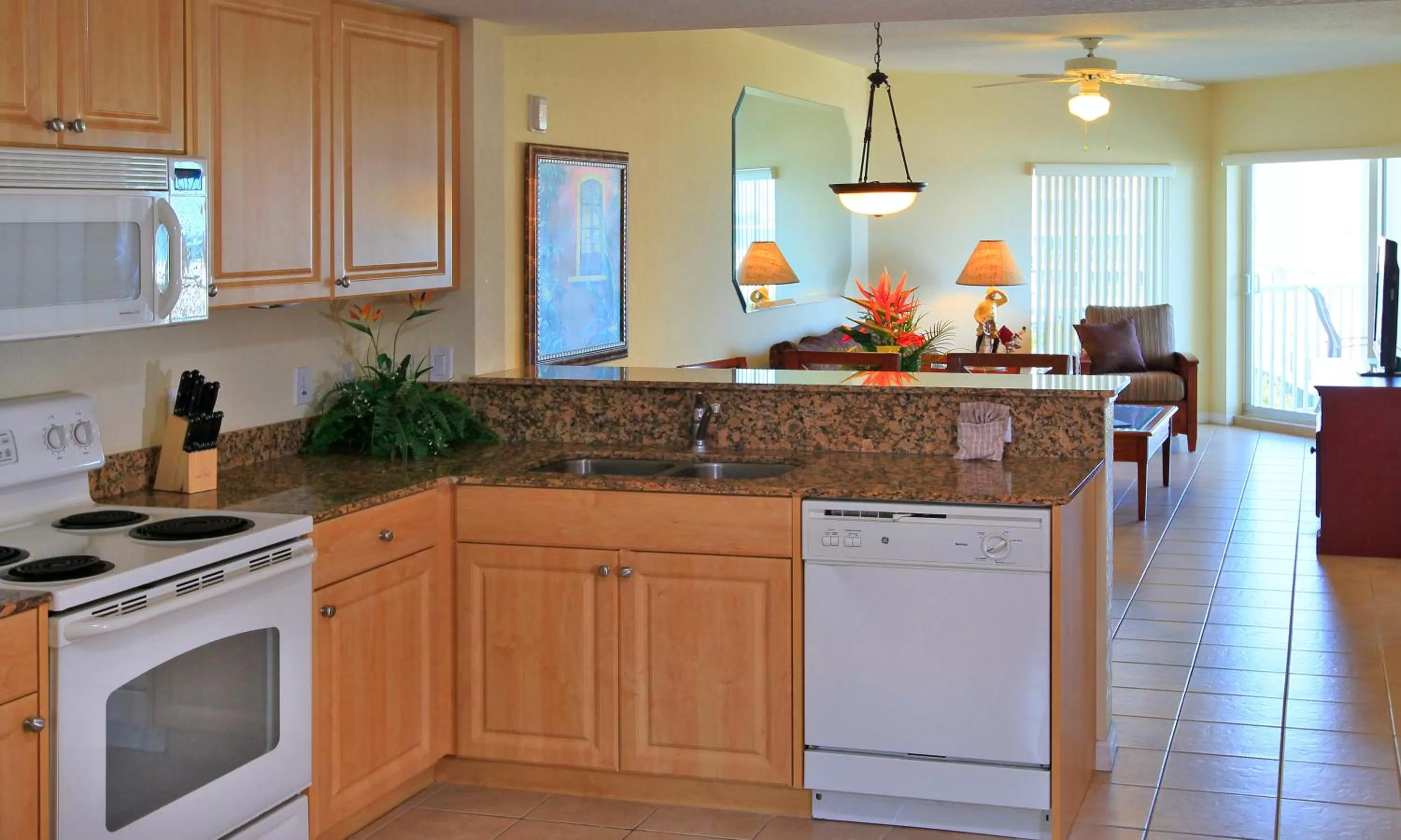 Kitchen or kitchenette in Sunset Vistas Two Bedroom Beachfront Suites