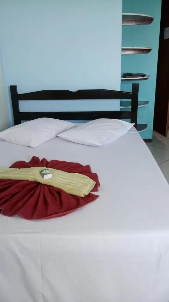 Bed in Pousada Brisas de Setiba