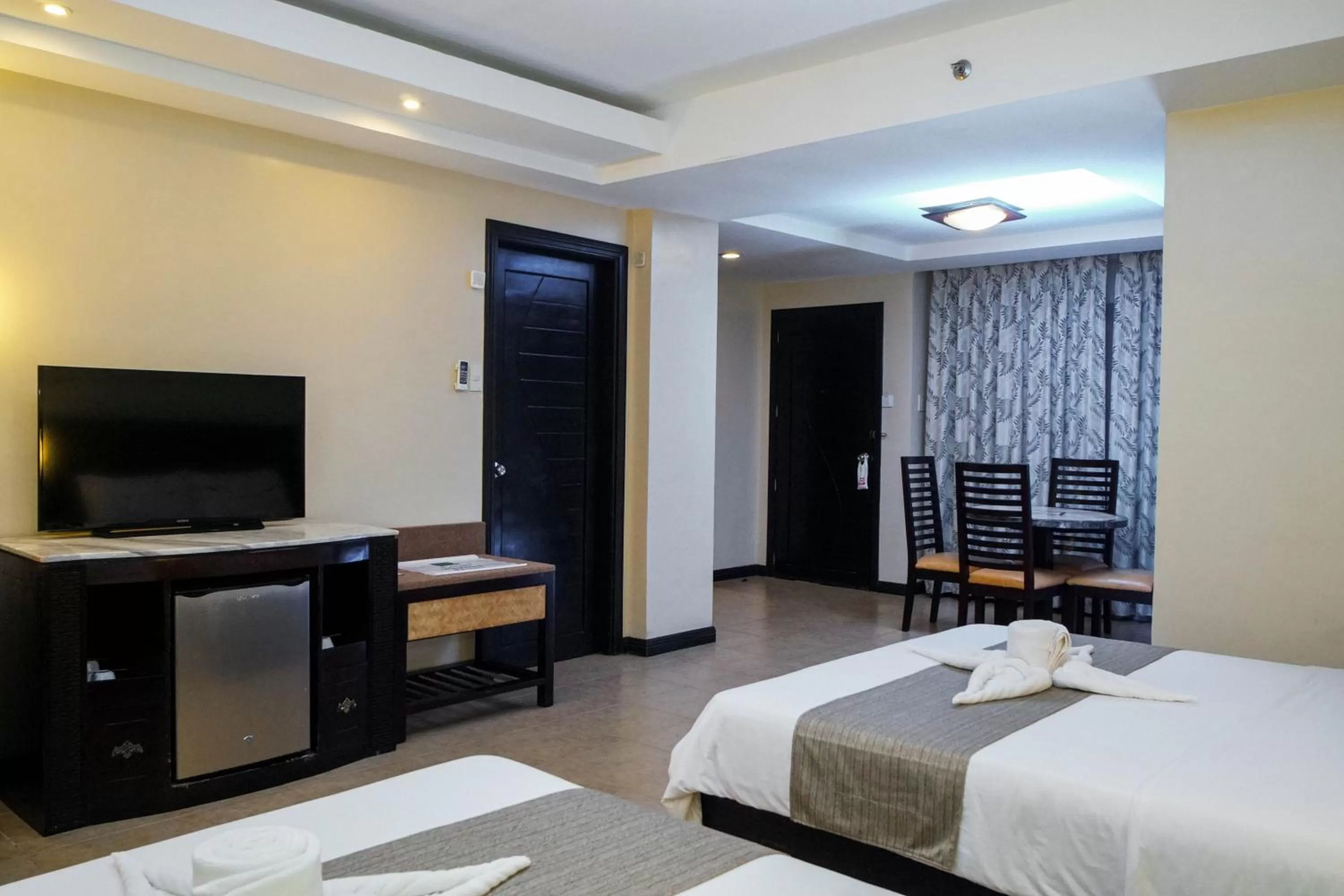 TV and multimedia, Bed in Coron Westown Resort