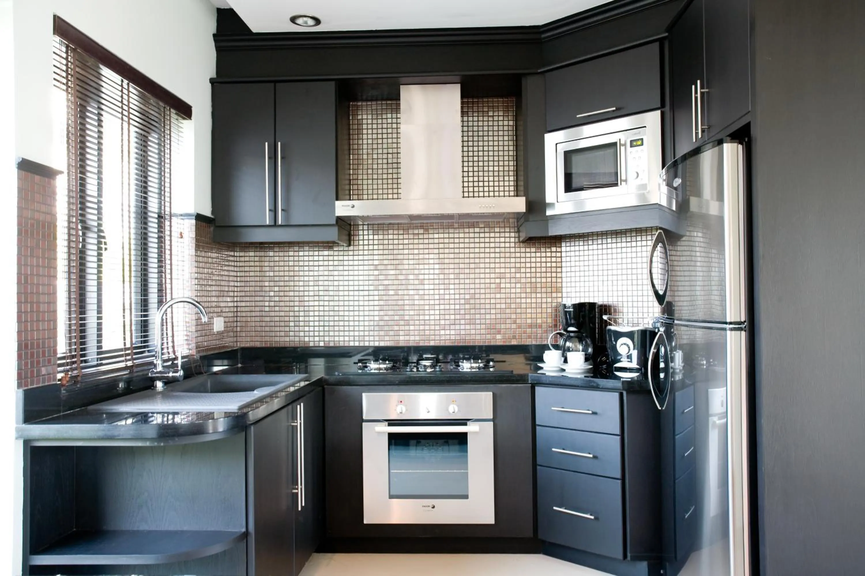 Kitchen or kitchenette in Palm Grove Resort, Pattaya