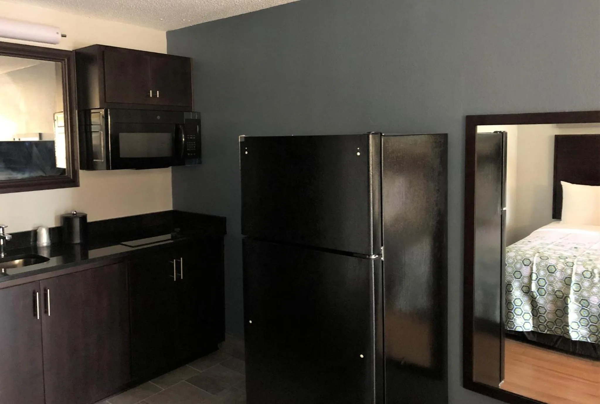 Photo of the whole room, Bed in HomeTowne Studios by Red Roof Augusta