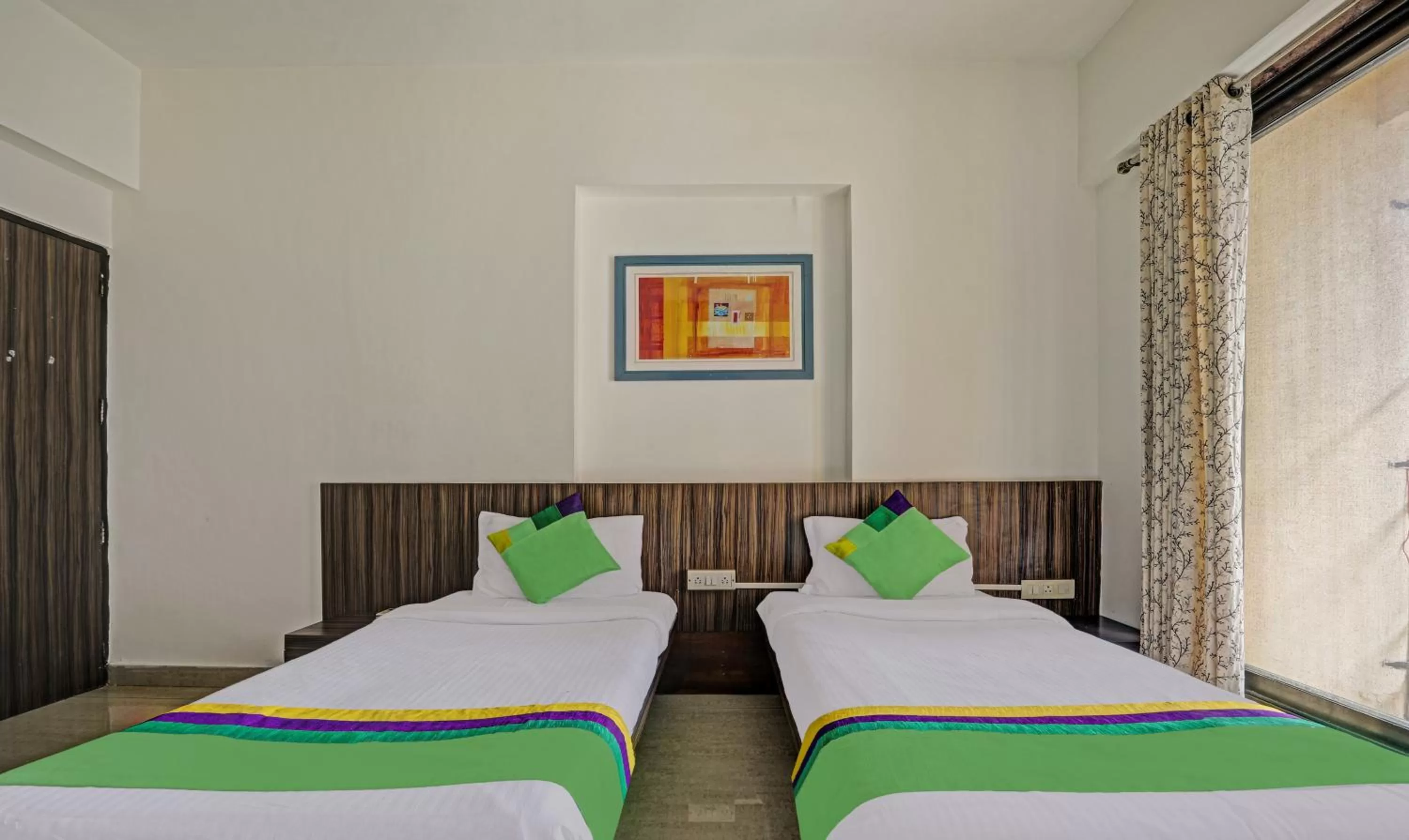 Bed in Treebo Trend Welcome Apartments