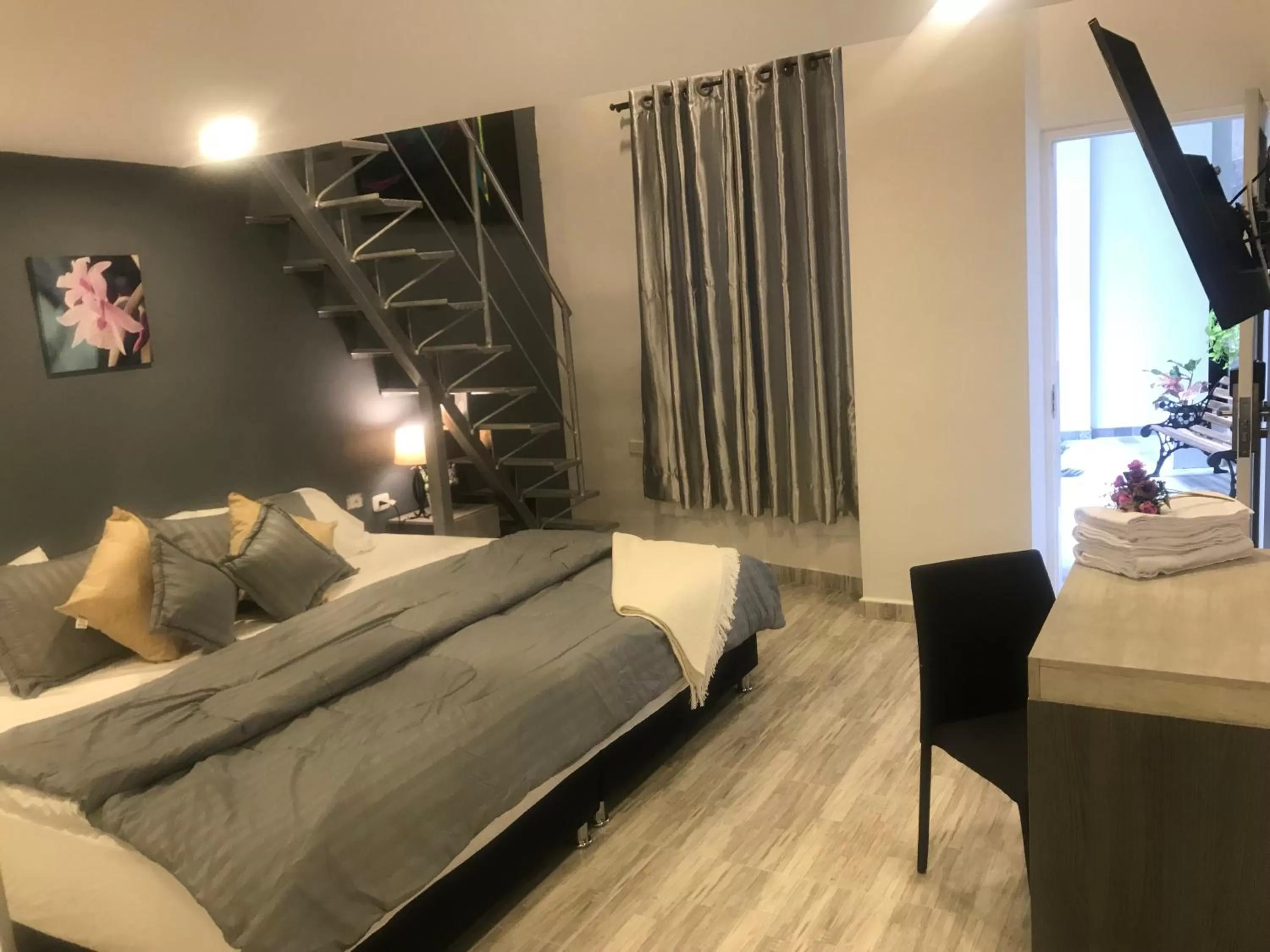 Bed in Bahia 79 Apartasuites Cerca al Centro