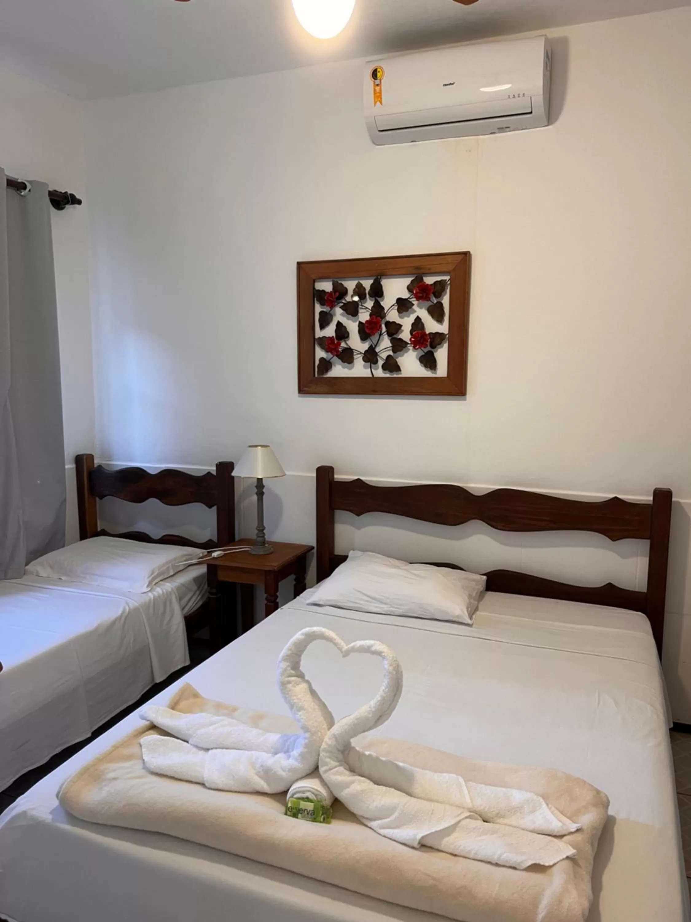 Bed in Pousada Portal de Paraty