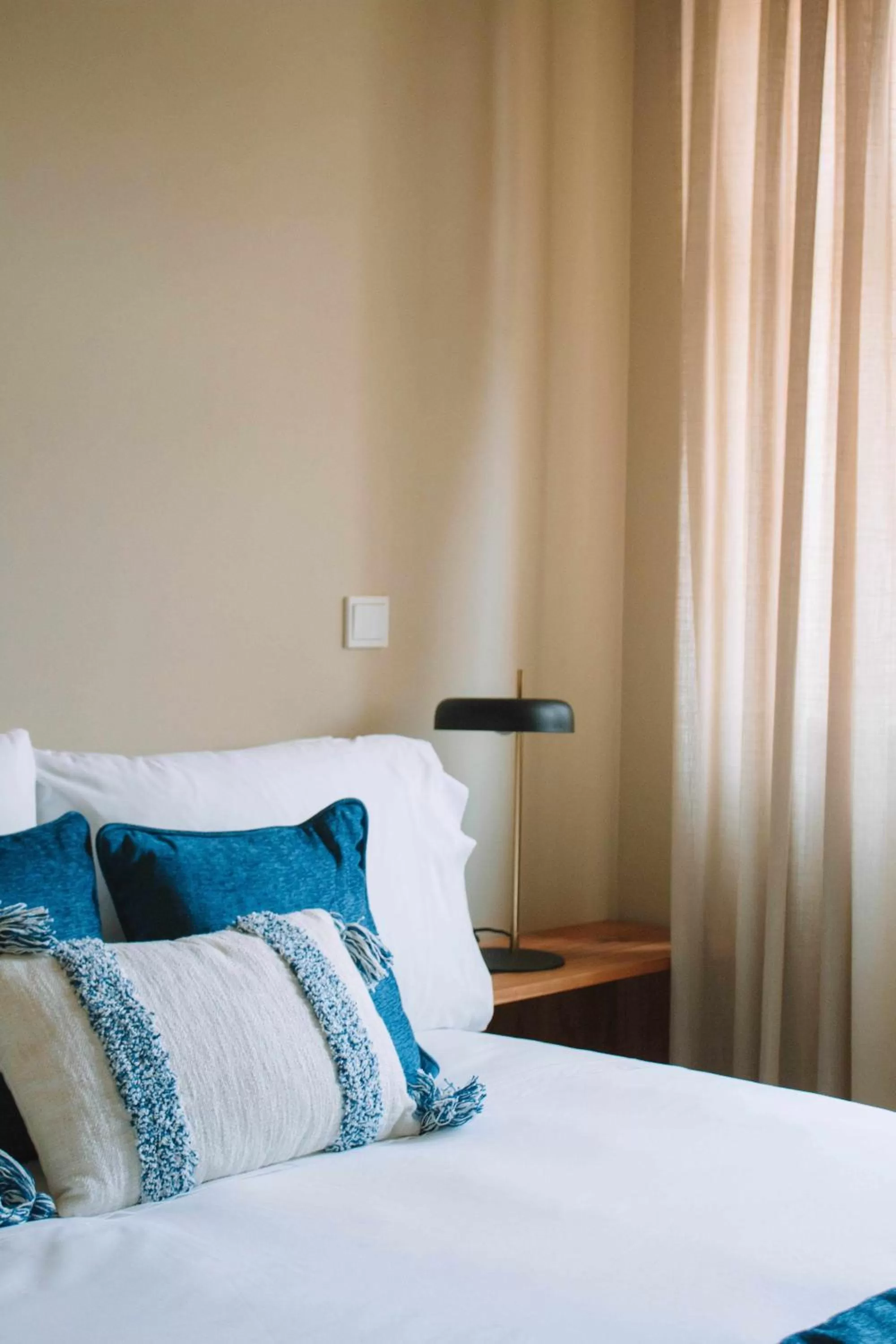 Bed in Villa Theatro Heritage Apartments