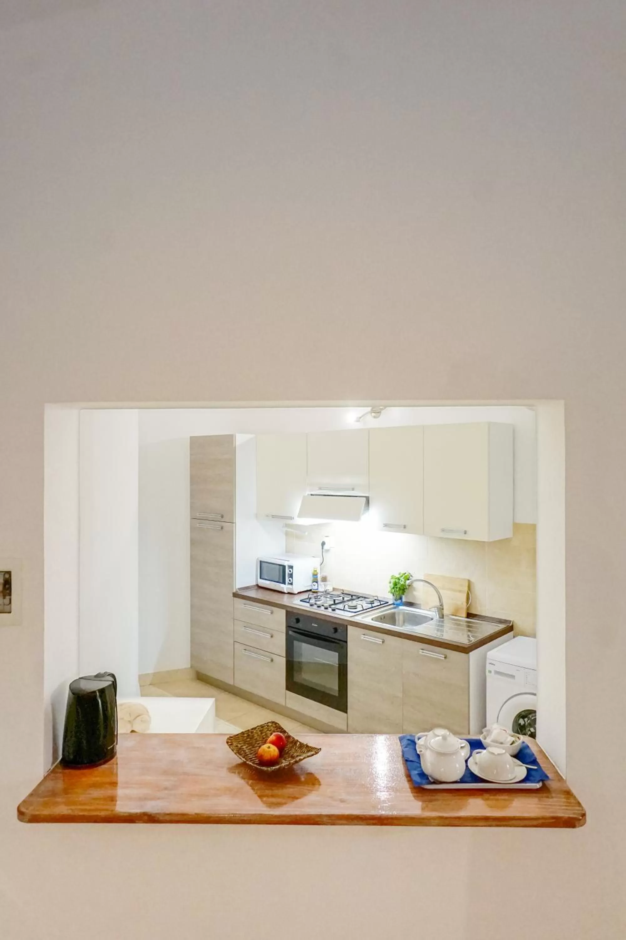 Kitchen or kitchenette in Branco Suites - Rooms & Holiday Apartments