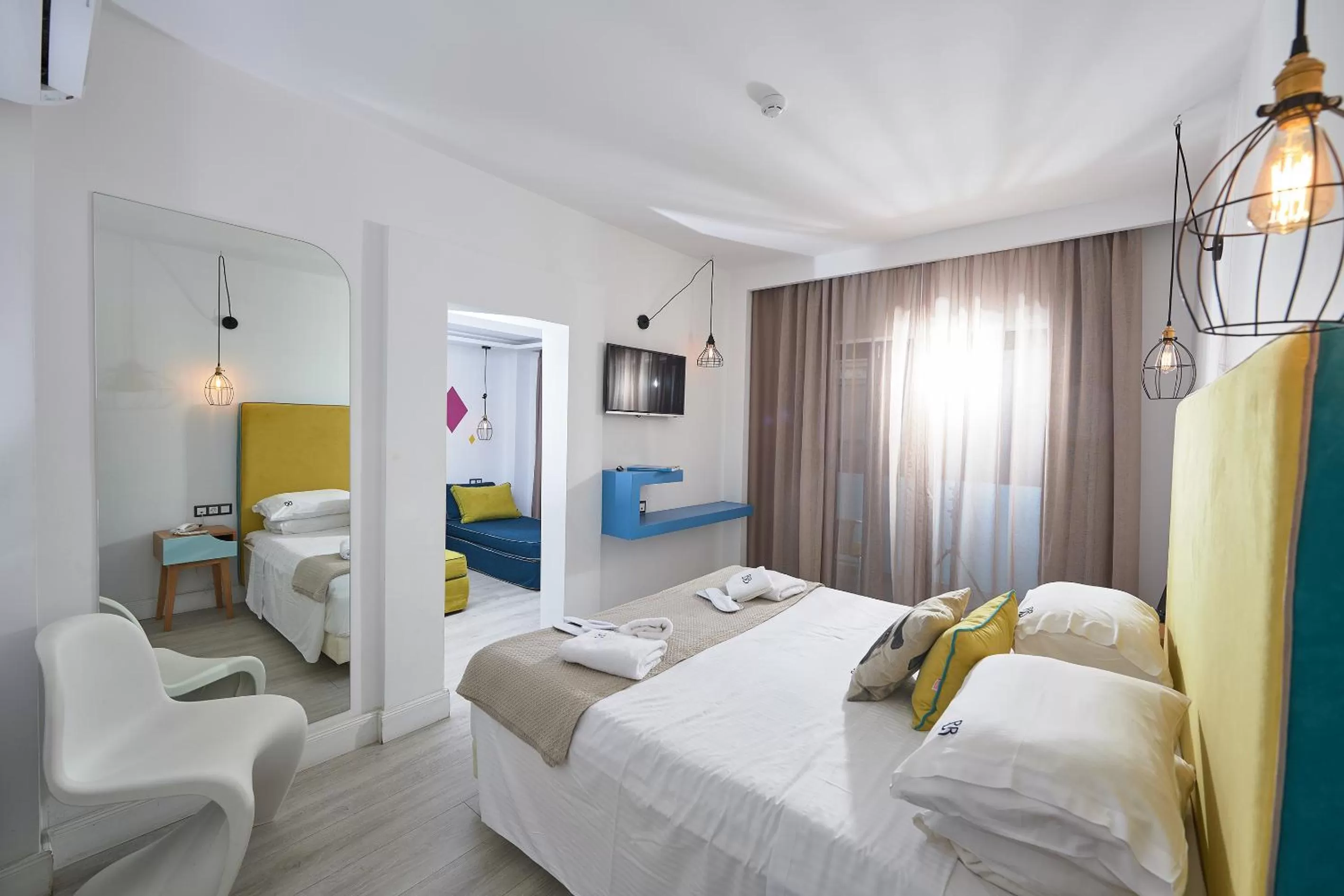 Bed in Blue Bottle Boutique Hotel