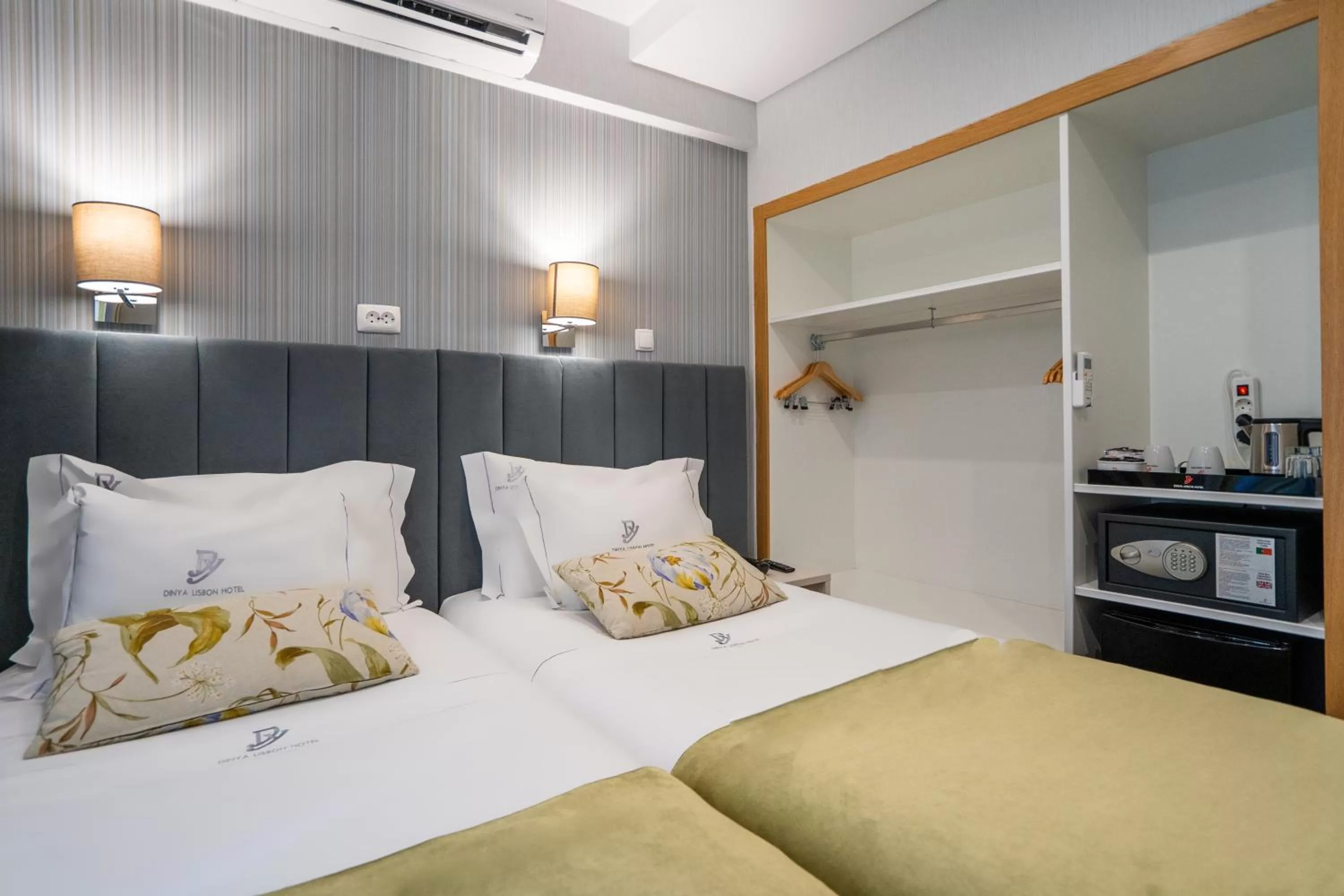 Bed in Dinya Lisbon Hotel