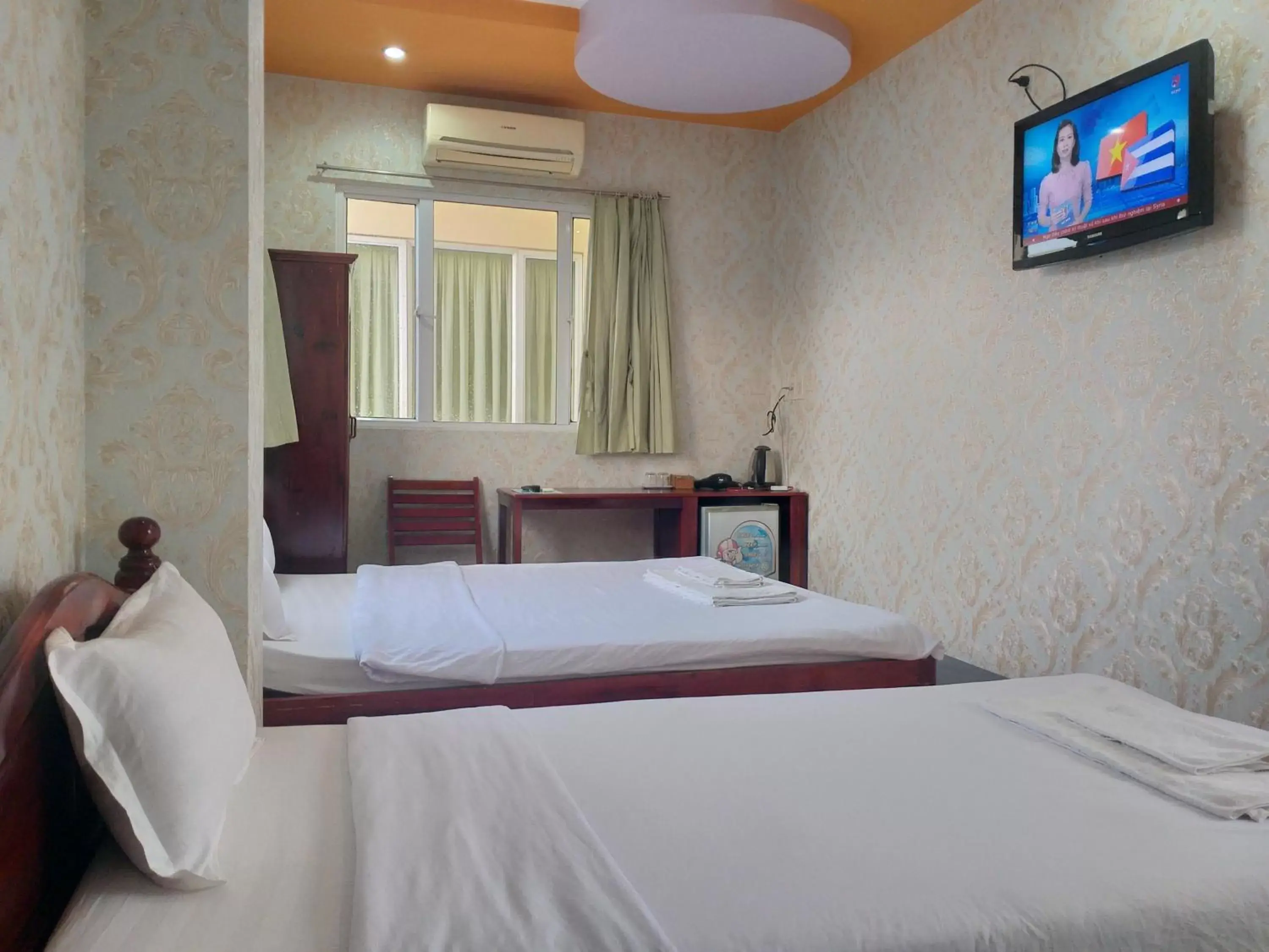 Deluxe Triple Room in Hoang Hai Dang 1 Hotel Deluxe Triple Room in Hoang Hai Dang 1 Hotel