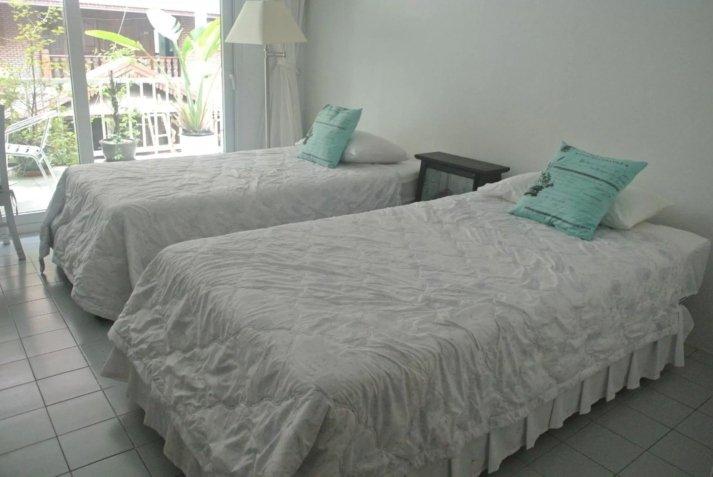 Bed in Oriental Smile Hotel