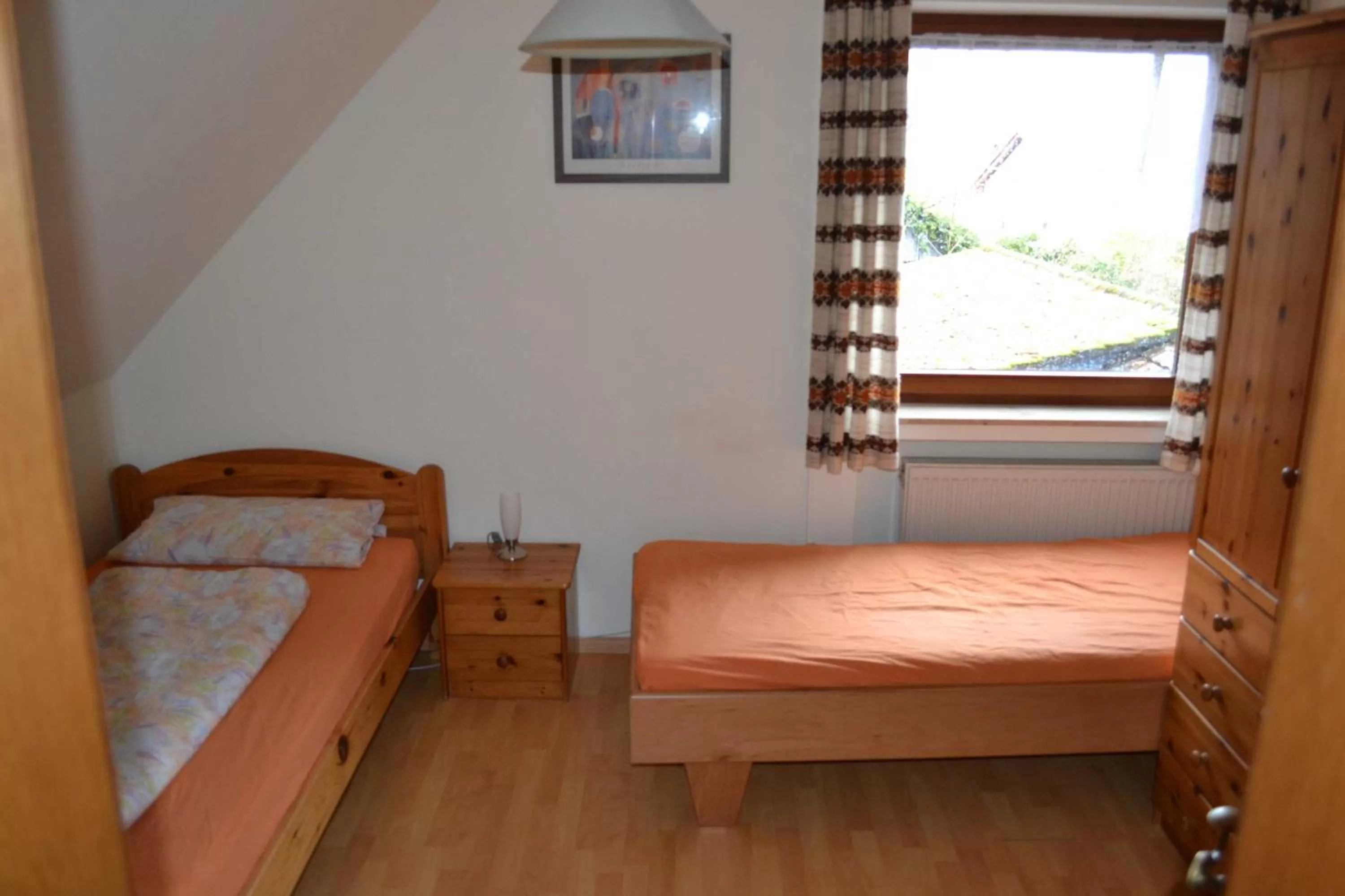 Photo of the whole room, Bed in Gaestehaus Tagescafe Eckenfels