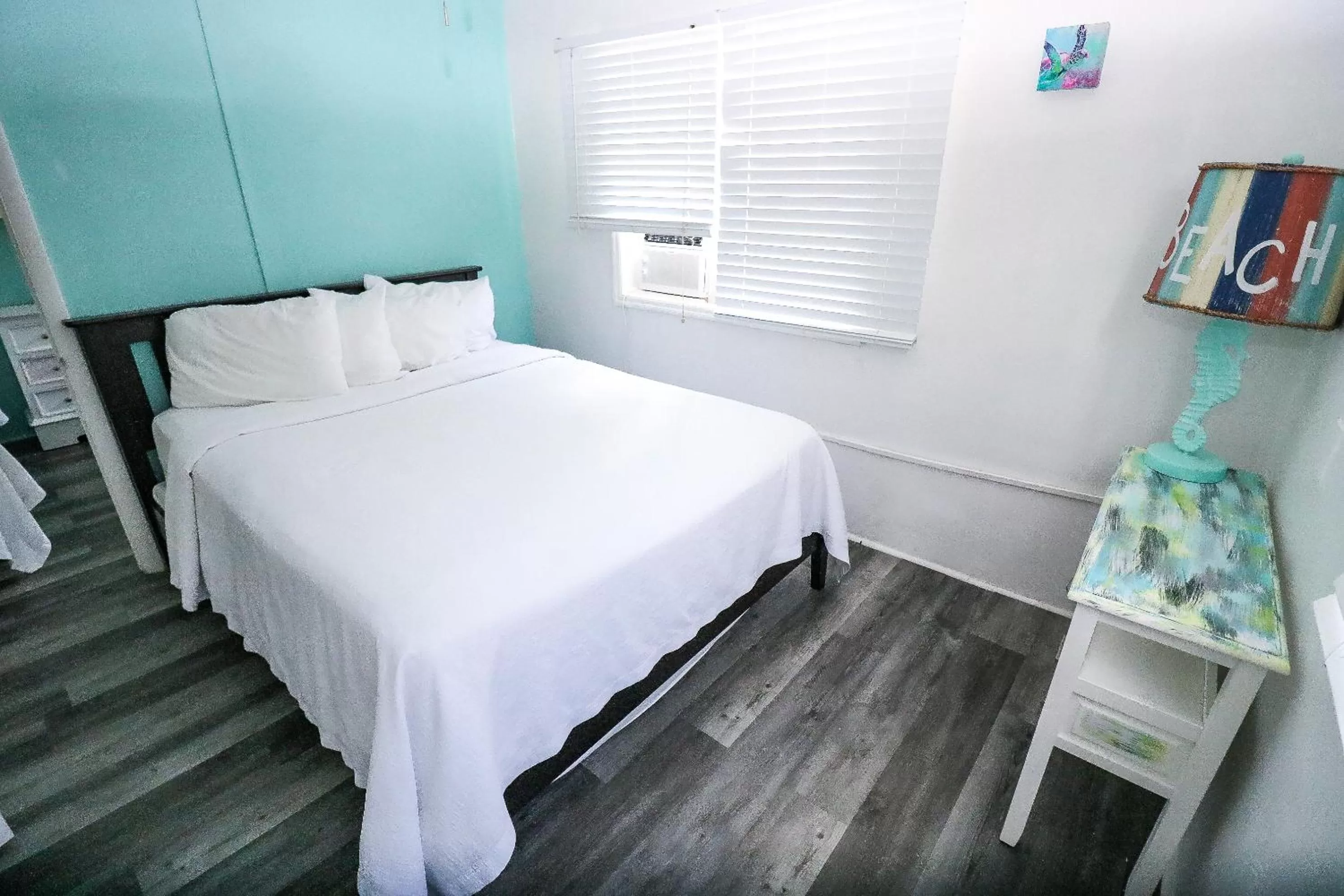 Bed in Drop Anchor Resort & Marina