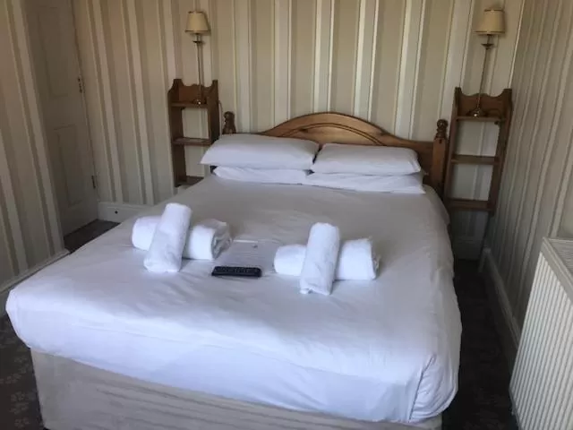 Bed in Penny Farthing Hotel & Cottages