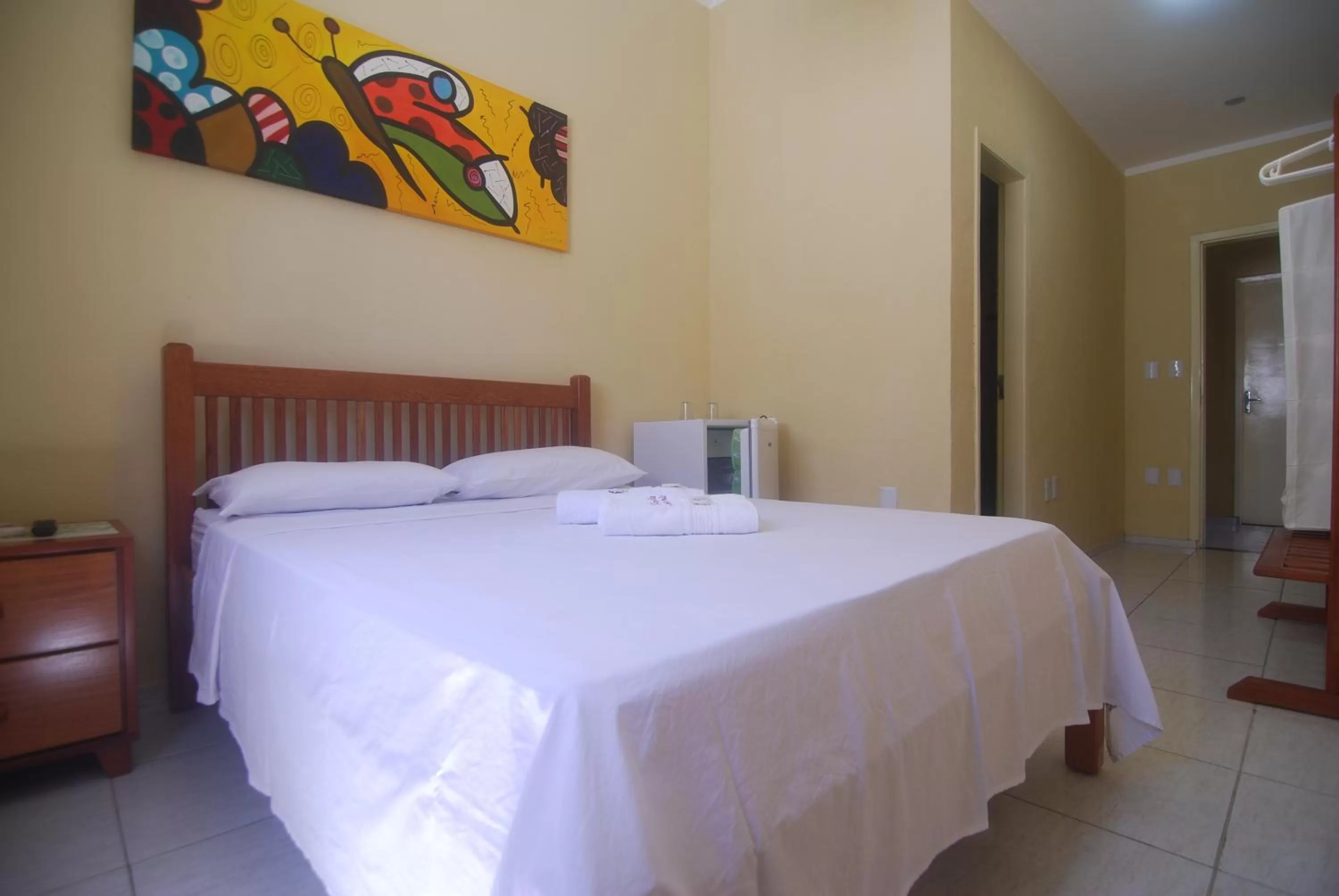 Bed in Refúgio Pousada Fortaleza