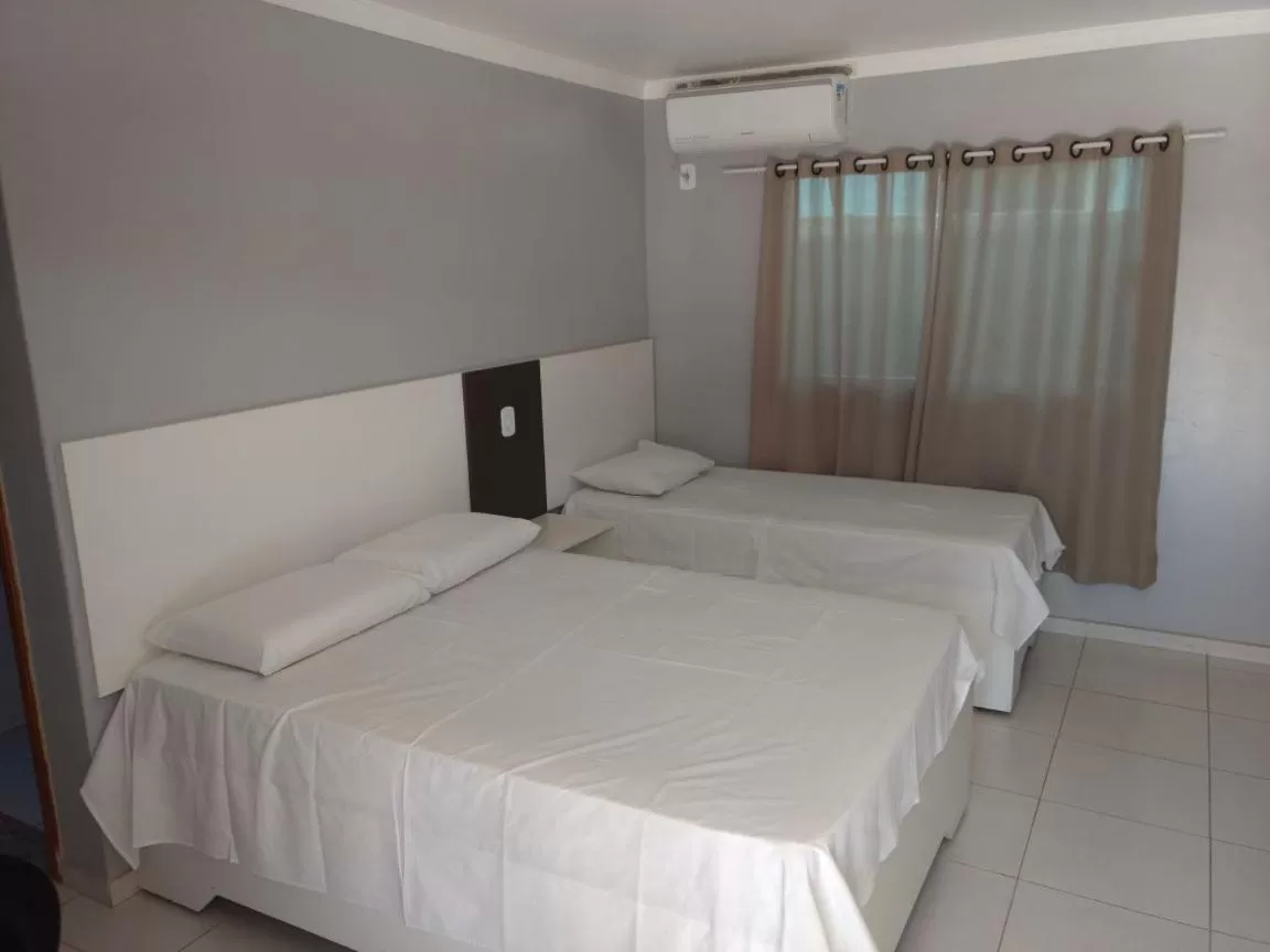 Bed in Hotel Serra do Rio