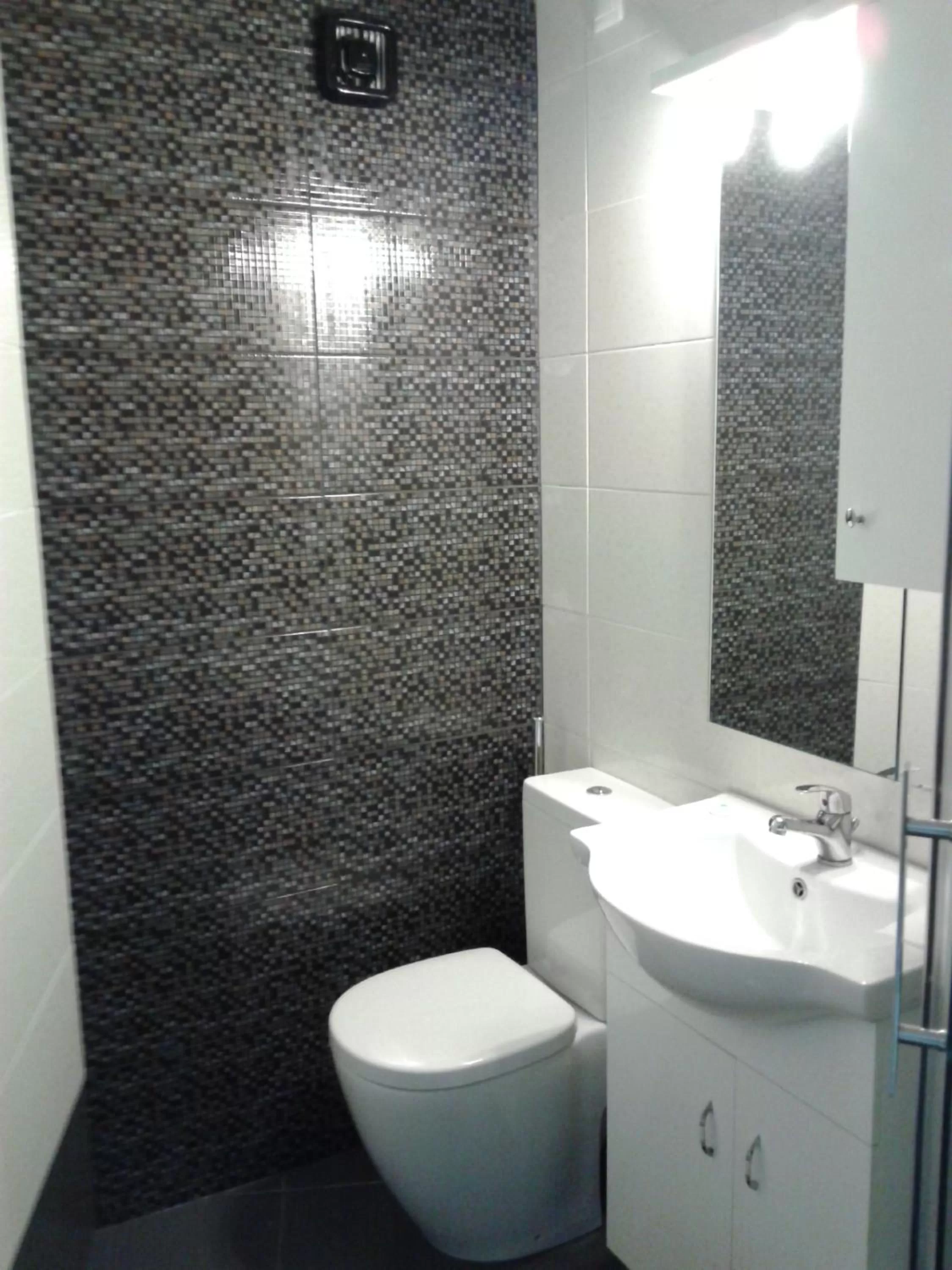 Bathroom in Fantasia Hotel Apartments